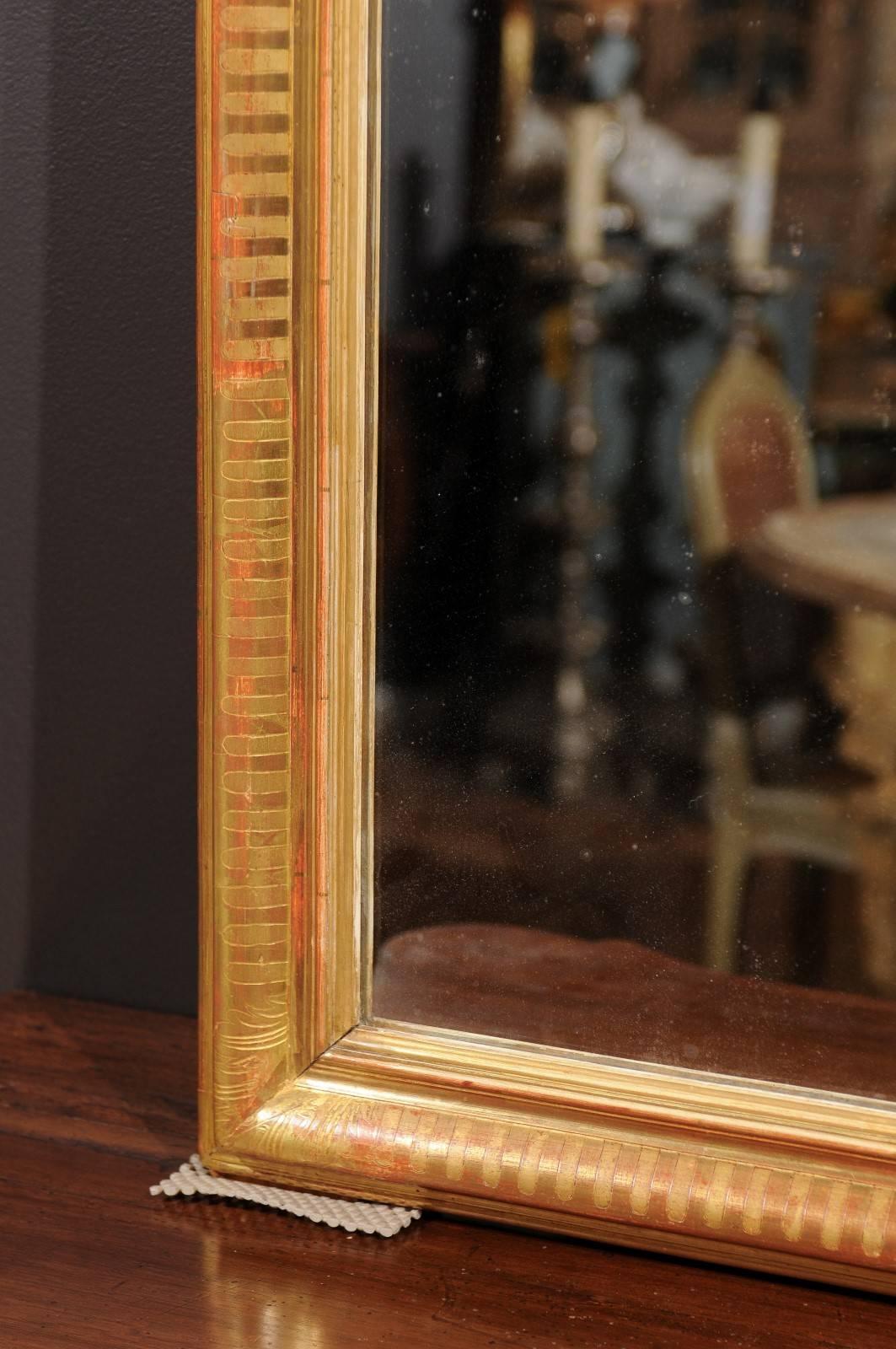 French Rococo Style Tall Giltwood Mirror with Carved Crest from the 1880s 5