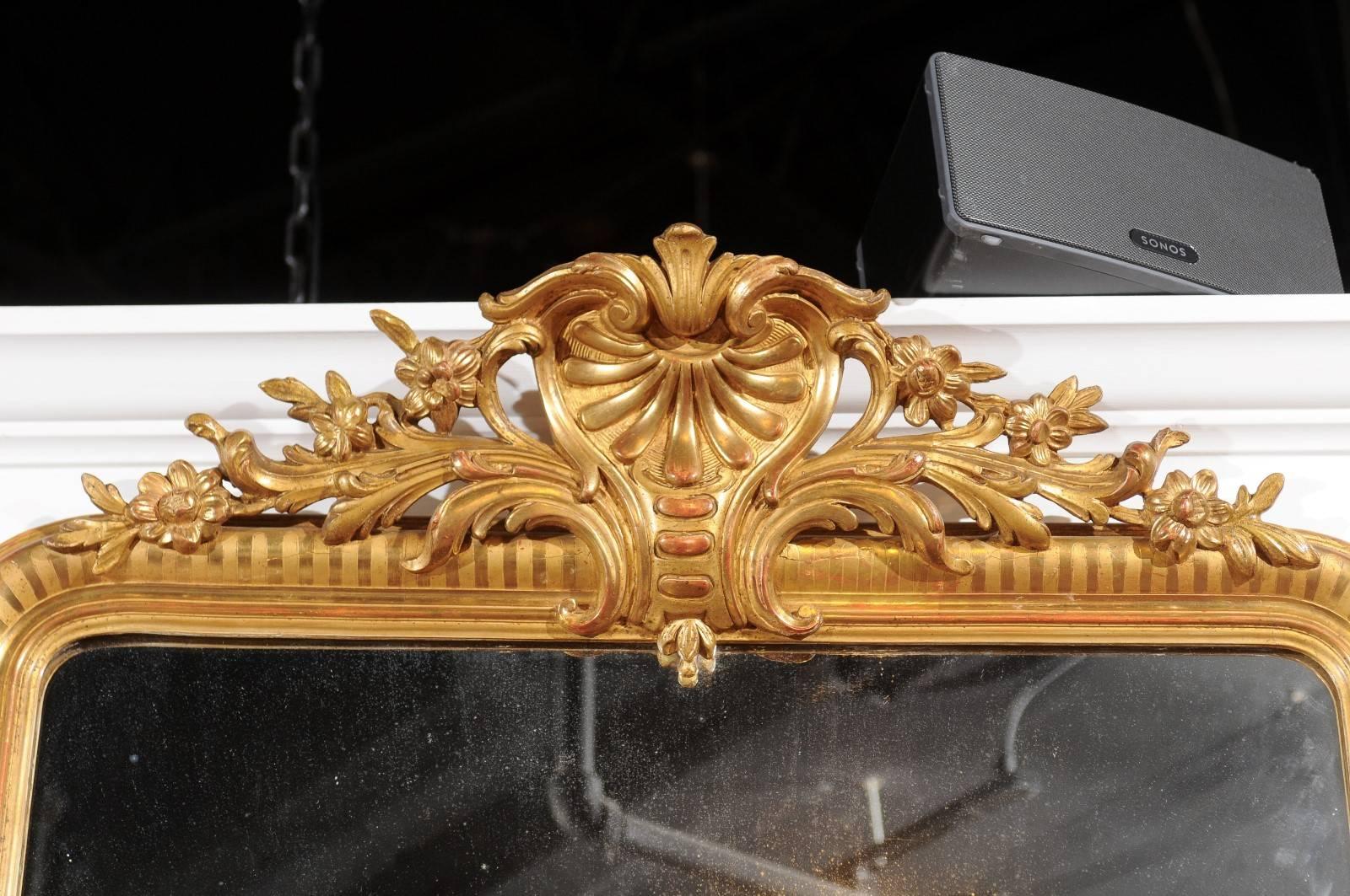French Rococo Style Tall Giltwood Mirror with Carved Crest from the 1880s 3