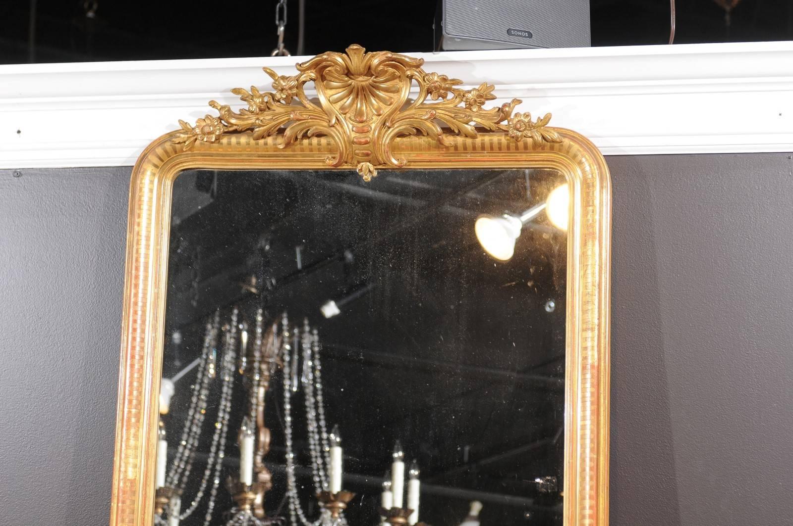 French Rococo Style Tall Giltwood Mirror with Carved Crest from the 1880s 1