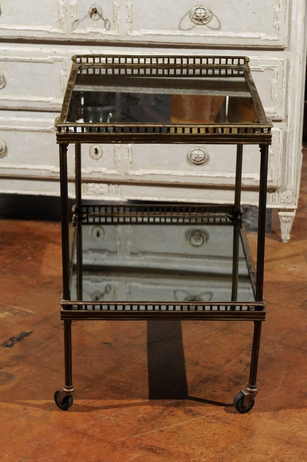 20th Century Continental Tiered Brass Trolley on Casters with Mirrored Shelves, circa 1900