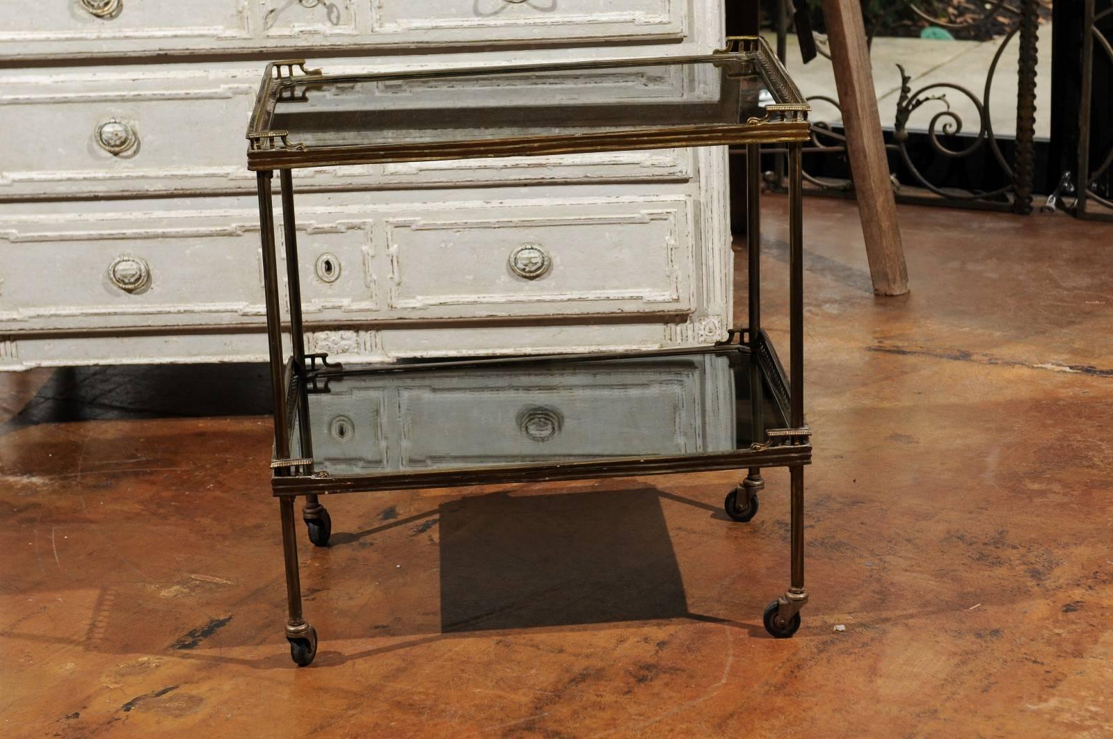 European Continental Tiered Brass Trolley on Casters with Mirrored Shelves, circa 1900