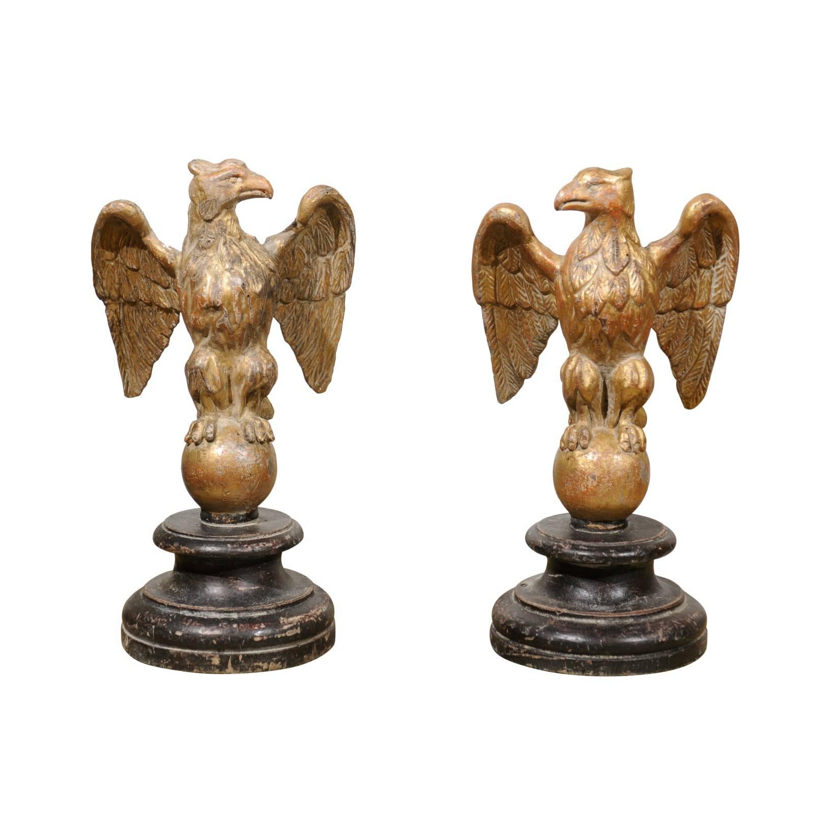 Pair of Italian Giltwood Eagles on Spheres Sculptures on Round Black Plinths