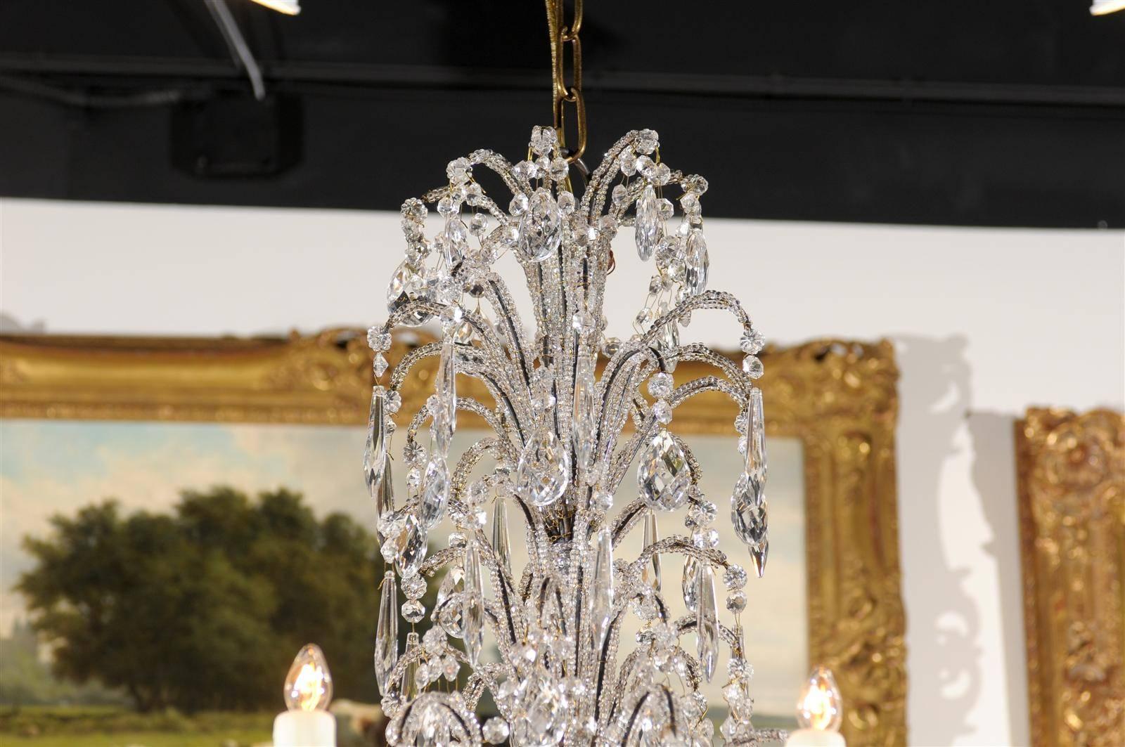 20th Century Italian Crystal Eight-Light Chandelier with Beaded Arms and Giltwood Bobèches