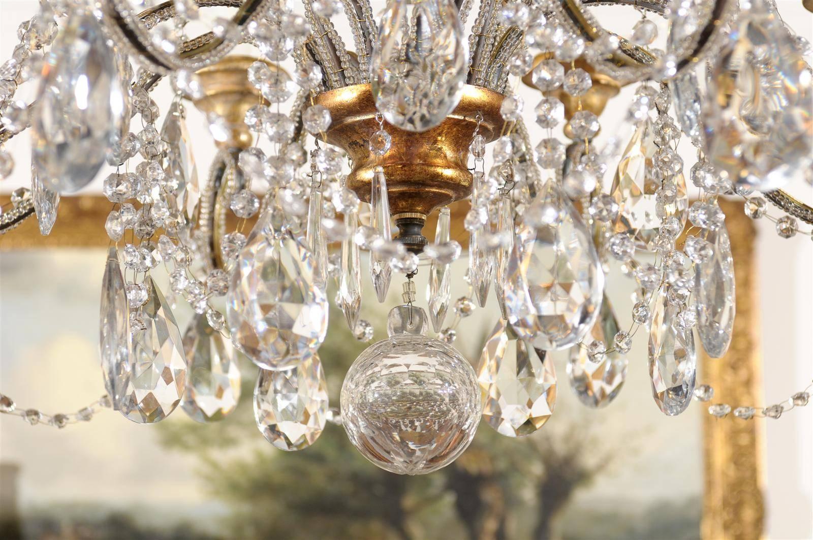 Metal Italian Crystal Eight-Light Chandelier with Beaded Arms and Giltwood Bobèches
