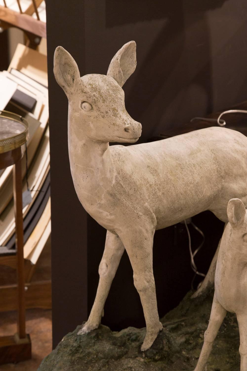 Pair of English Mid-Century Cast Stone Sculptures of a Doe and Her Fawn on Base 1