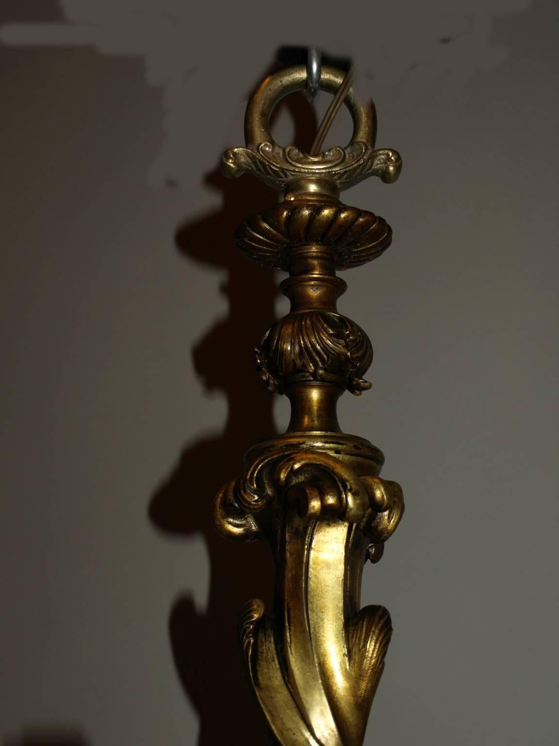 Exquisite gilt bronze ten-light Louis XV style chandelier, originally for candles, now electrified.