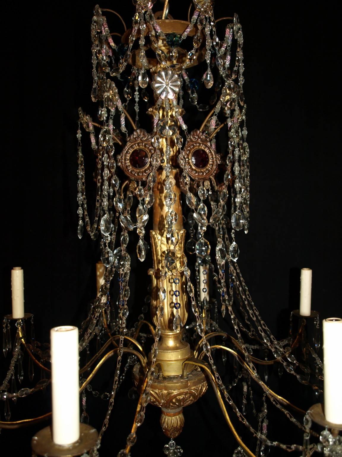 Early 19th century Genovese chandelier, originally for candles, now electrified with eight lights.