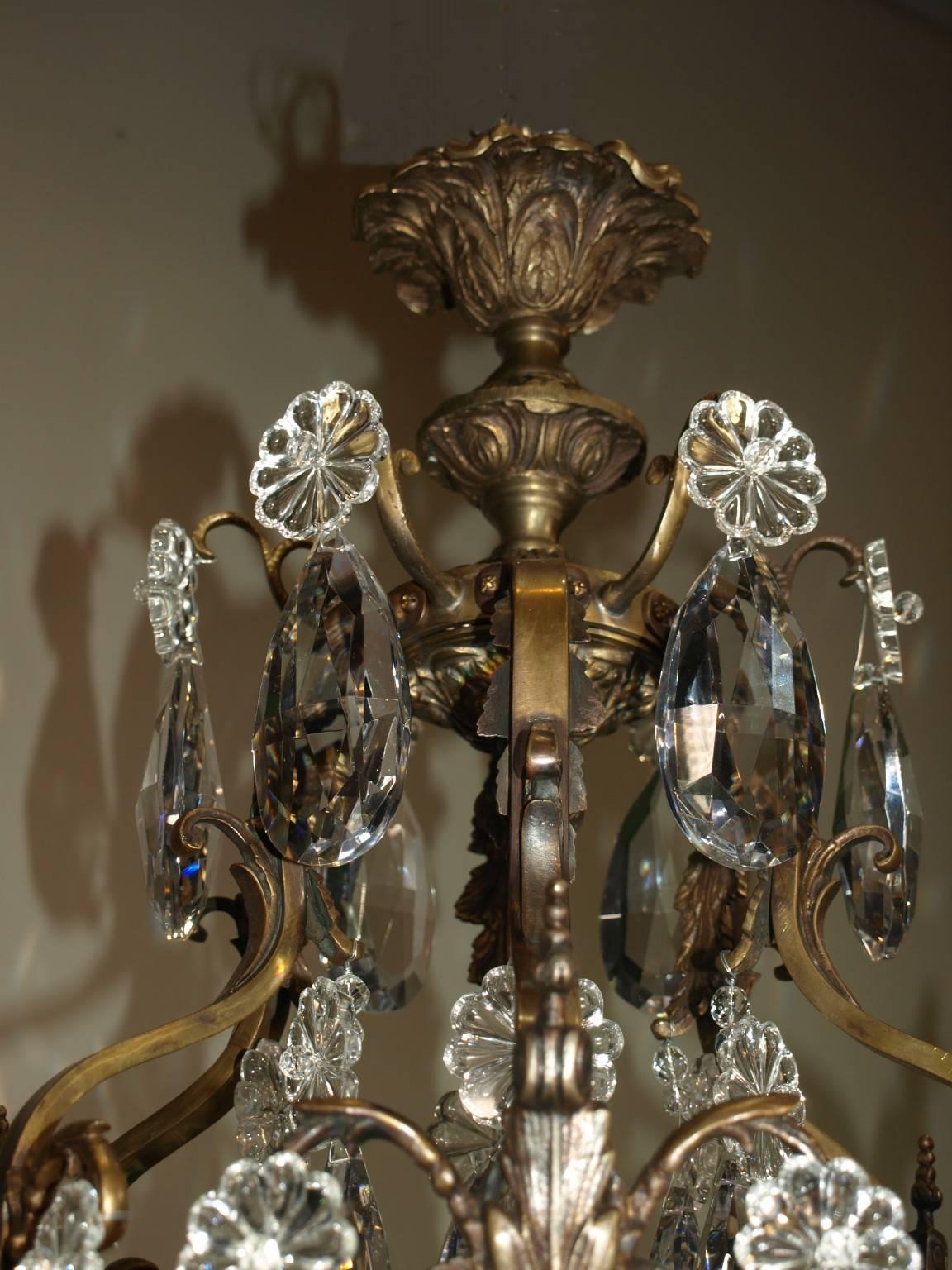 Very fine Louis XV cage style gilt bronze and crystal chandelier, 12 lights.
