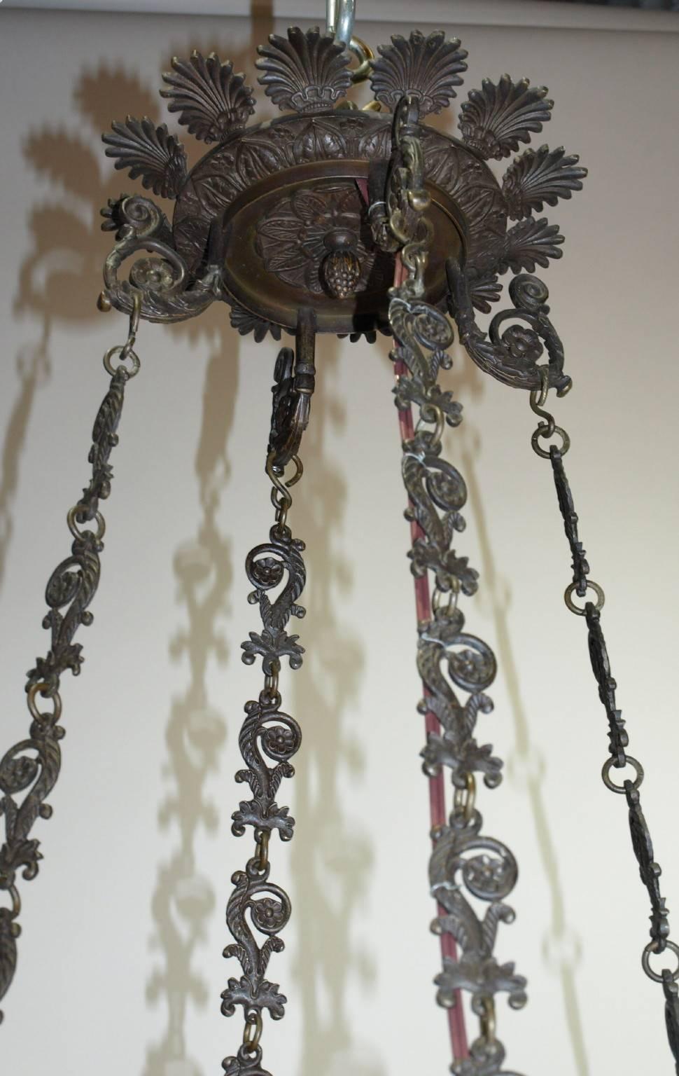 Superb quality eight-light Empire style bronze chandelier, exquisite detail. Originally for candles, now electrified.