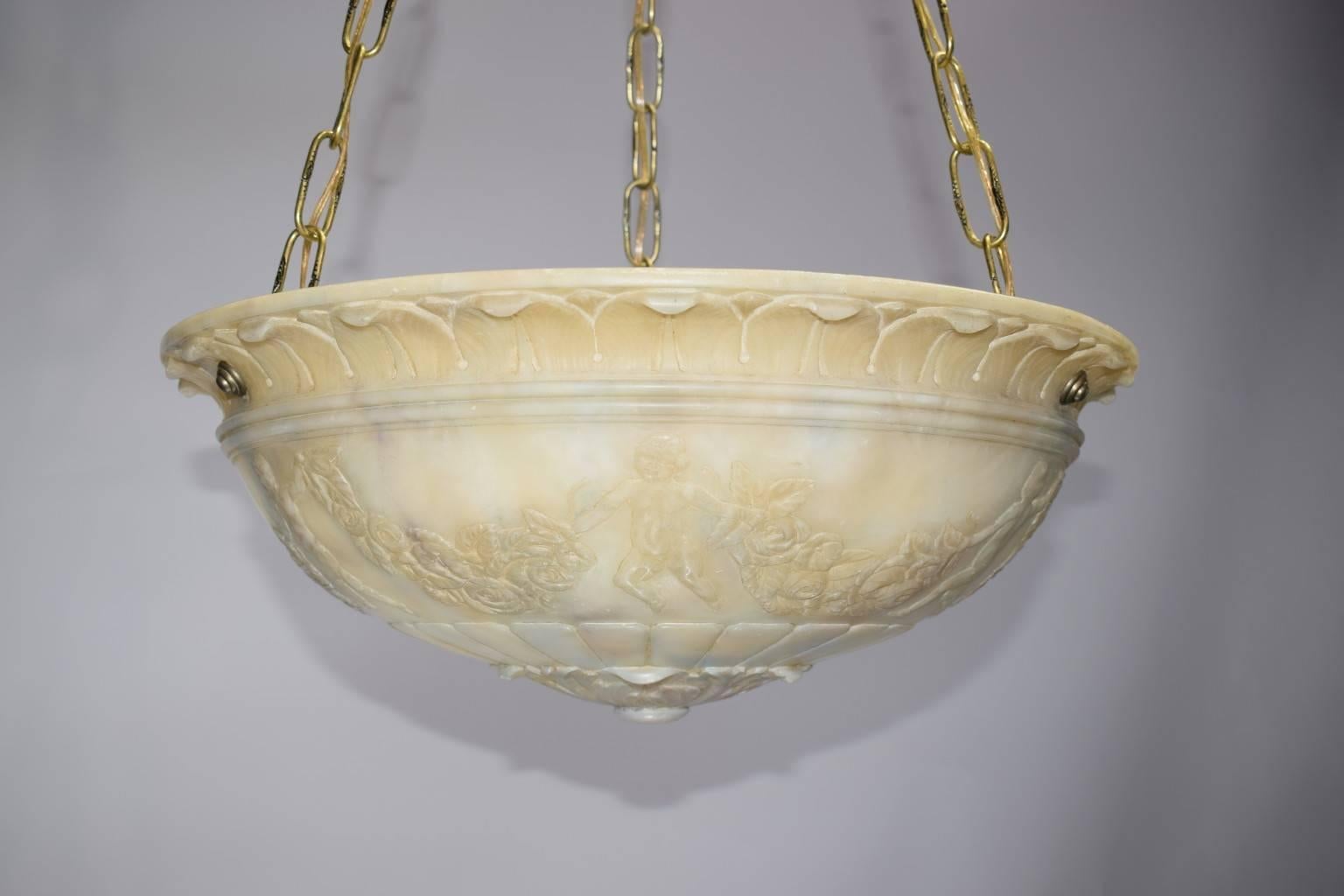 Very fine hand-carved French alabaster plafonnier with bronze canopy, three inside lights, height adjustable.