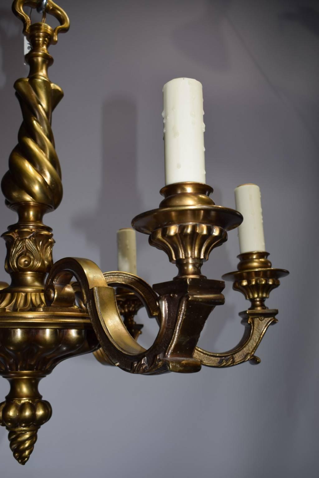 Regency style gilt bronze chandelier with twisted centre support, six lights.