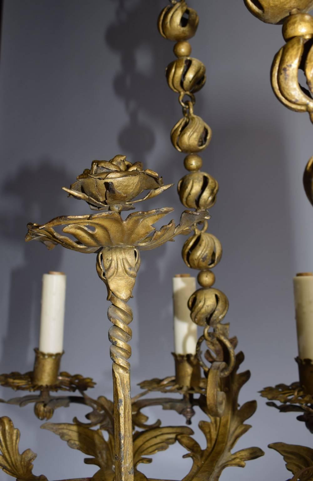 Very fine gilt iron chandelier from France, twelve lights.