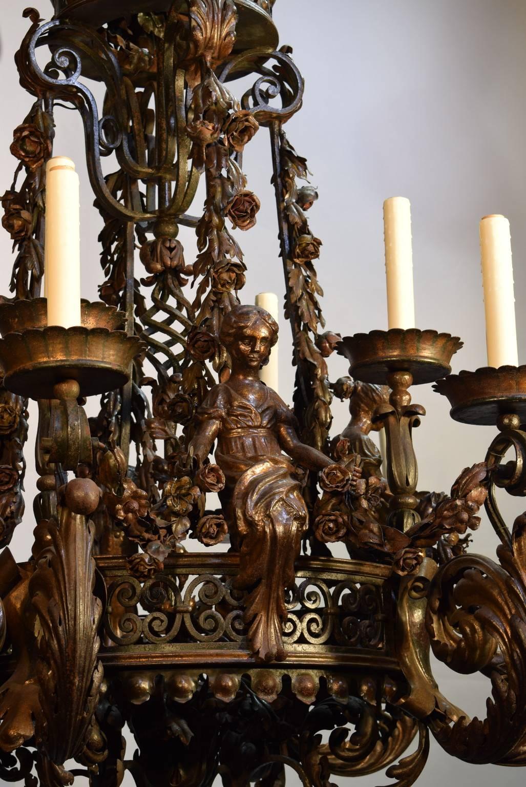 When you describe something as outrageous, sometimes that is an exaggeration. But there is no better way of describing this phenomenal fixture. It is a late 18th century all iron chandelier, featuring fire gilded maidens and incredible repousse