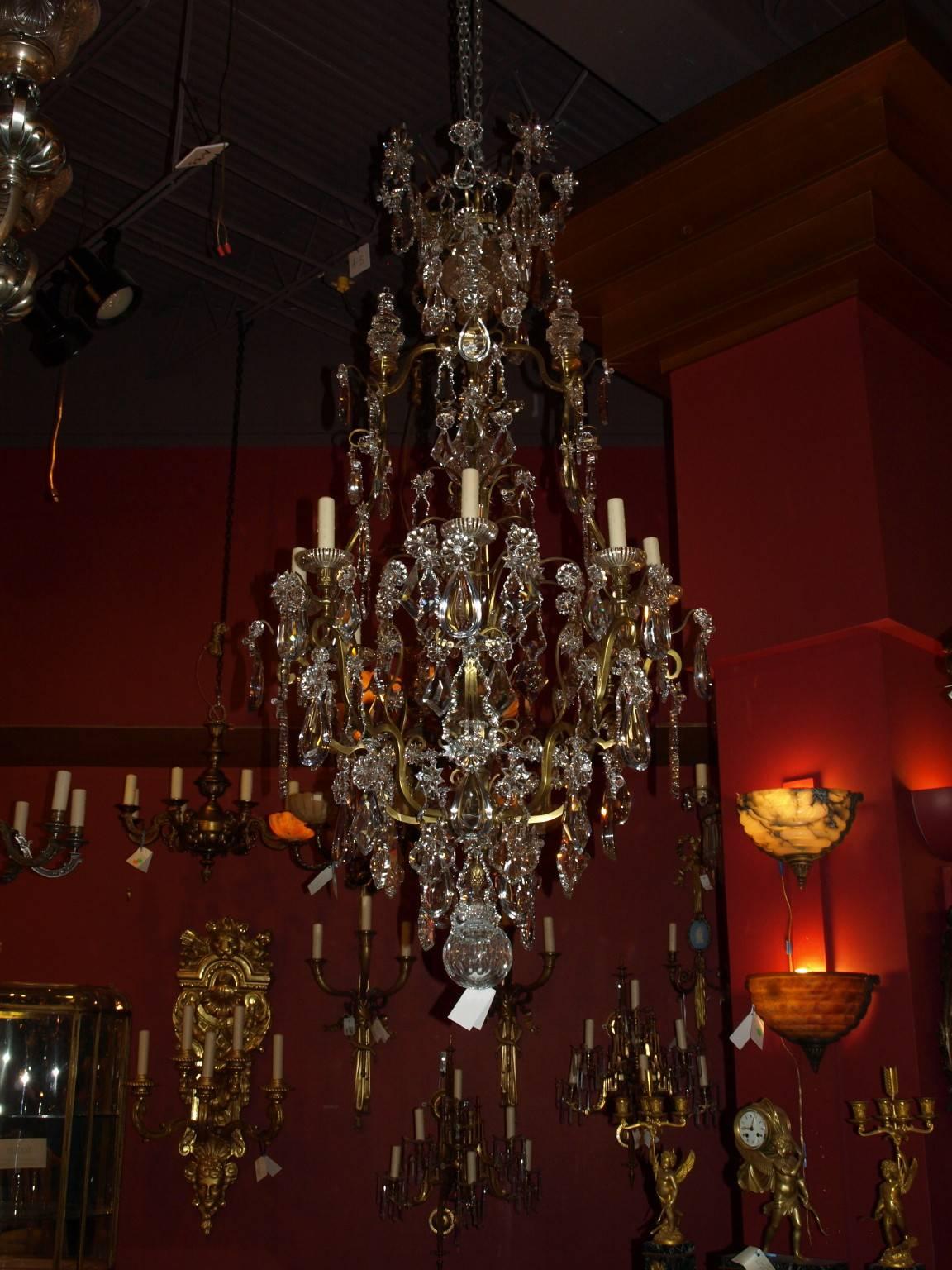 Elegant gilt bronze and crystal eight light 'cage style' chandelier by Baccarat