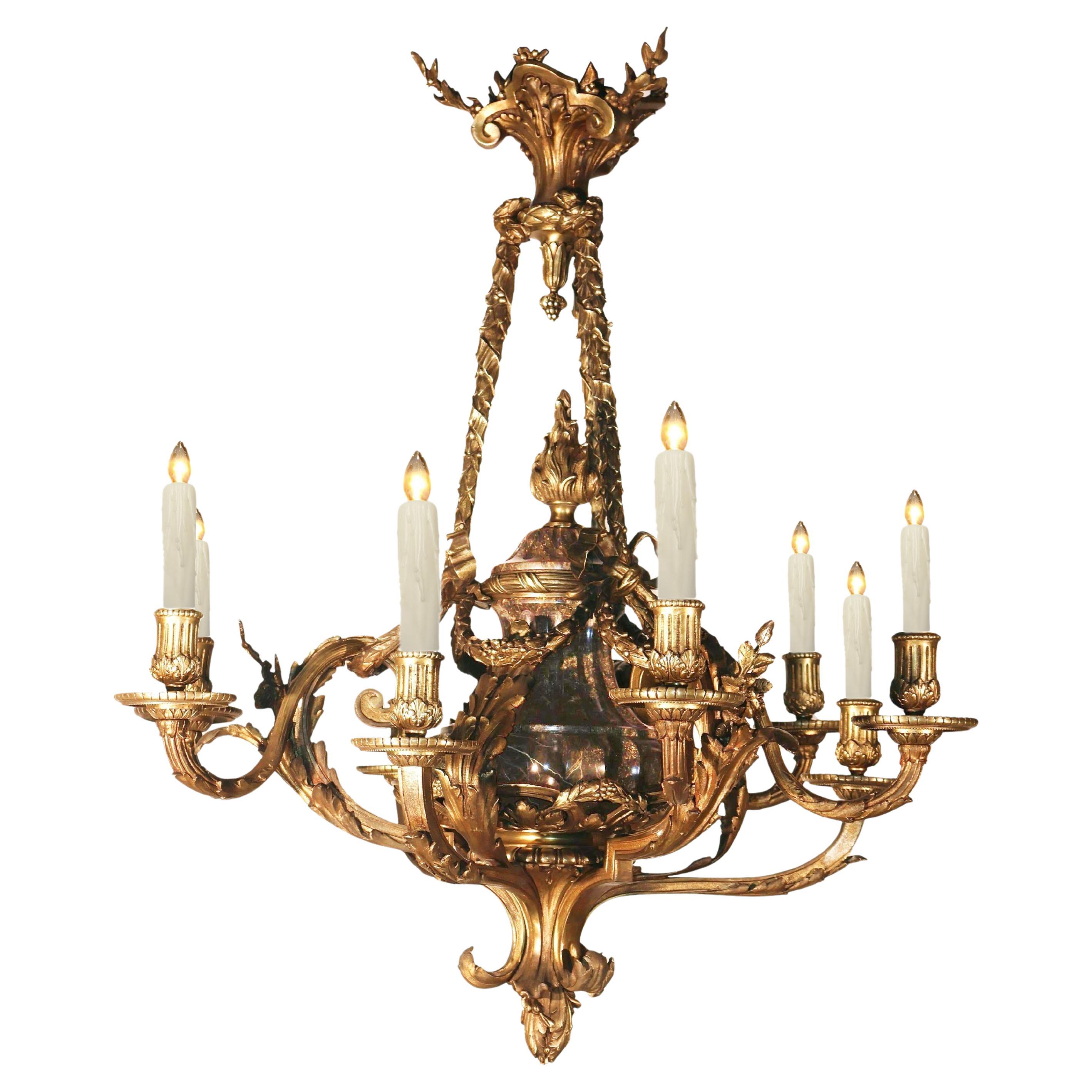 Lampadario in bronzo dorato e marmo