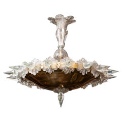 Lampadario in bronzo dorato e cristallo