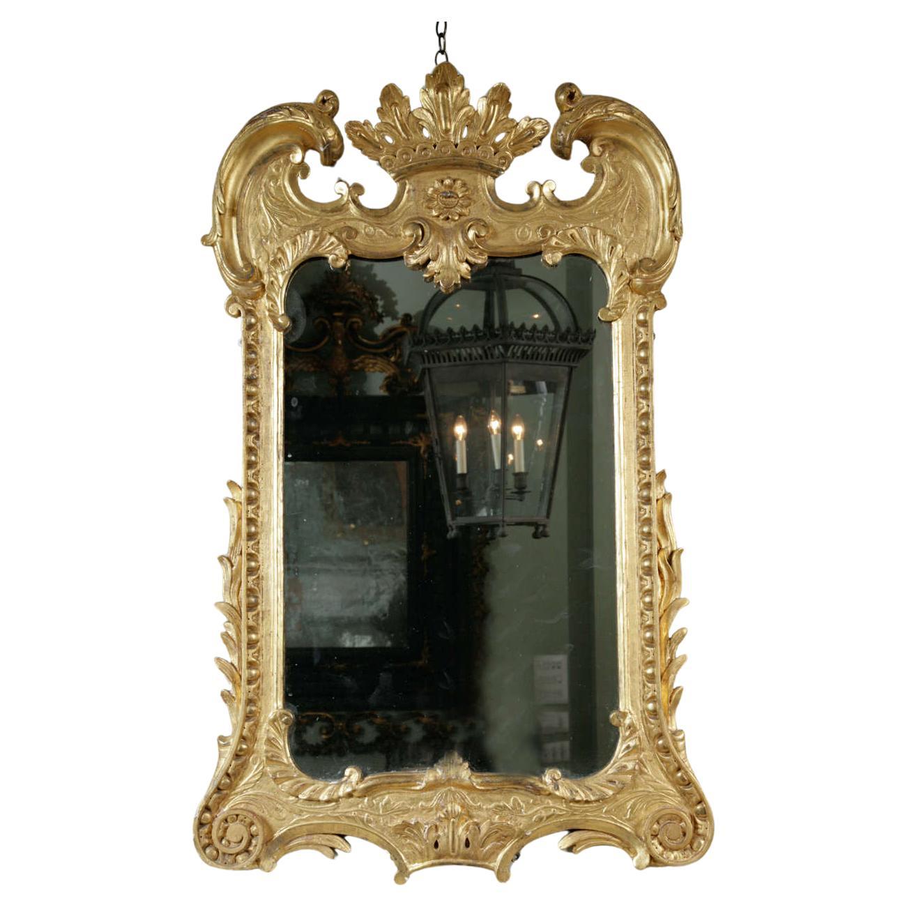 An Unusual 18th Century carved Giltwood Wall Mirror