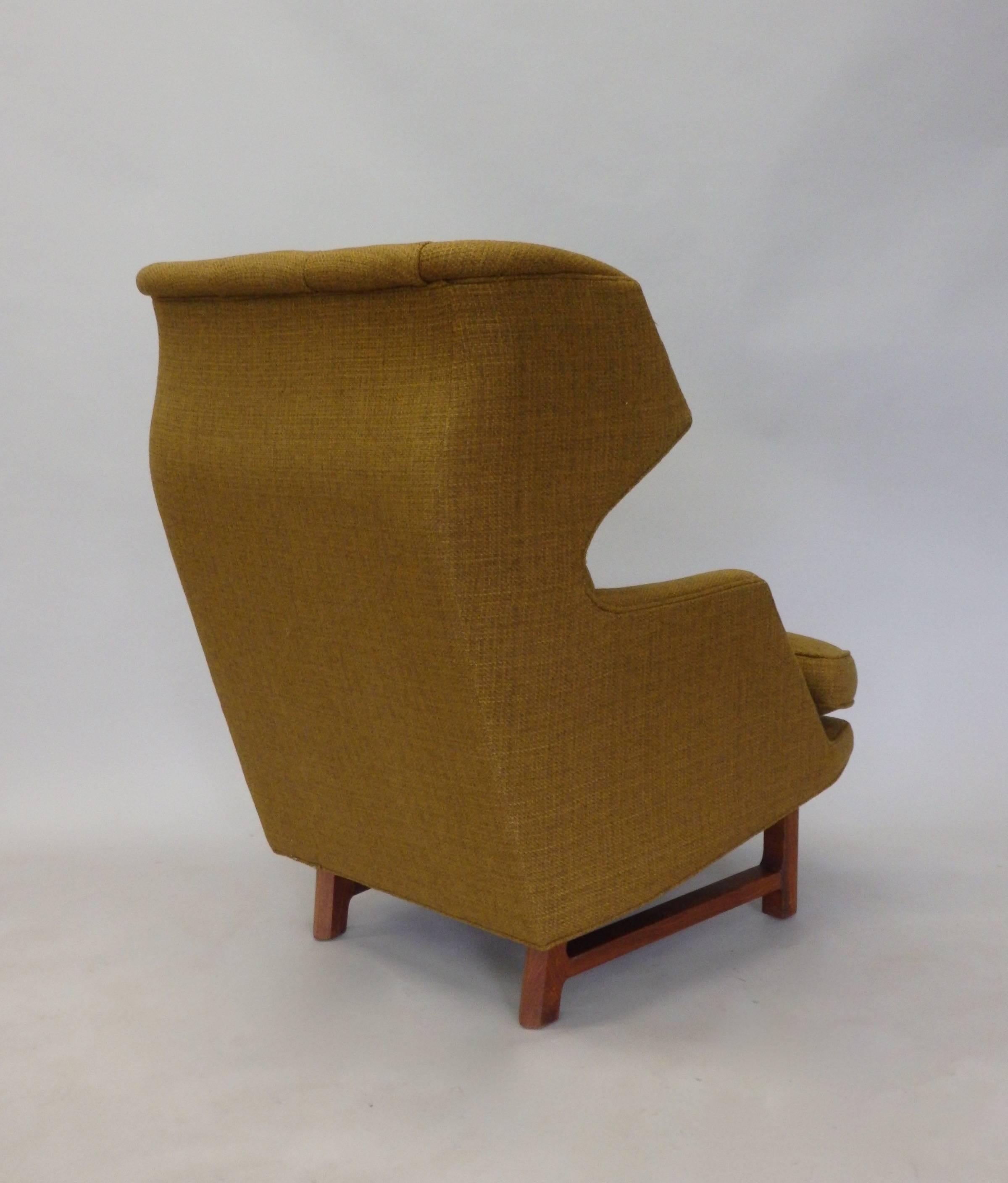 Large modernist wingback lounge chair designed by Edward Wormley as part of the Janus collection for Dunbar. Completely original and untouched estate chair. Foam in the upper part of the chair has started to desiccate. Down filled seat cushion is