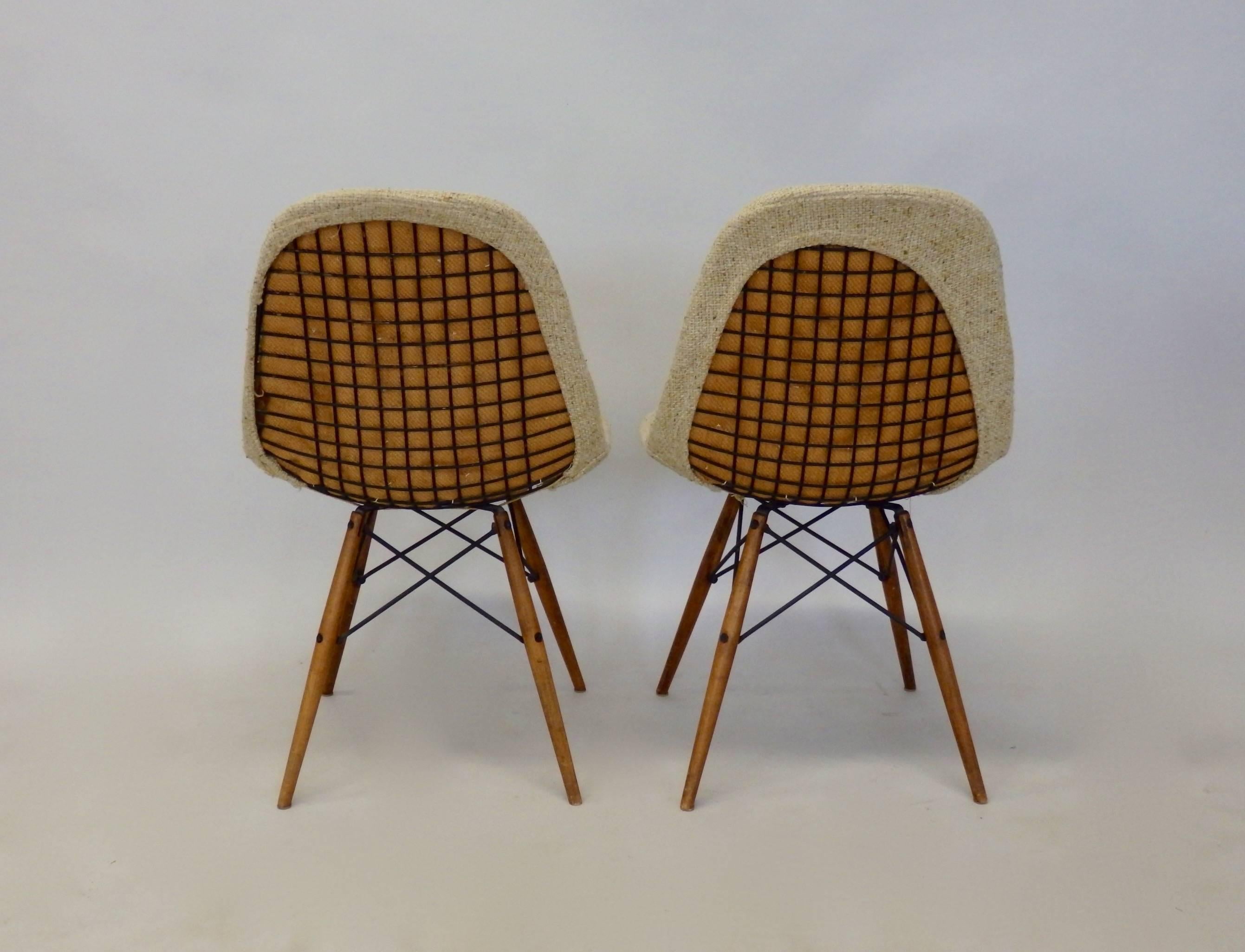 Pair of early production Charles and Ray Eames dowel leg dining chairs. Very nice as found patina / condition.