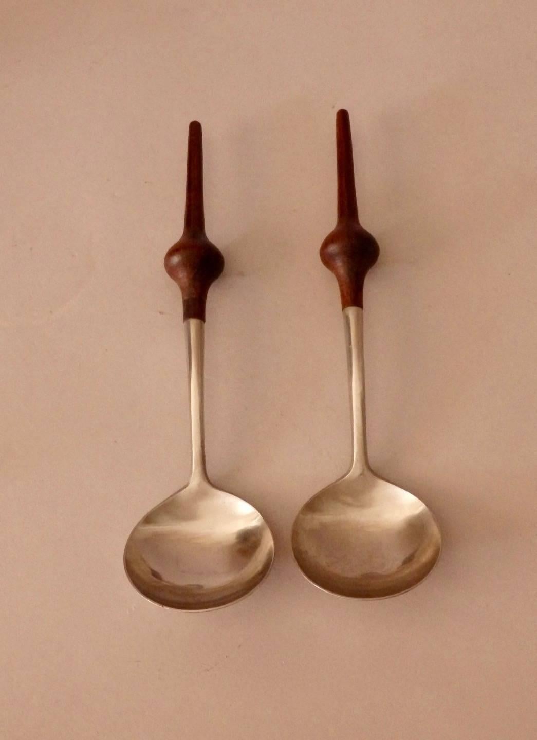 Quite rare rosewood handle stainless serving spoons.