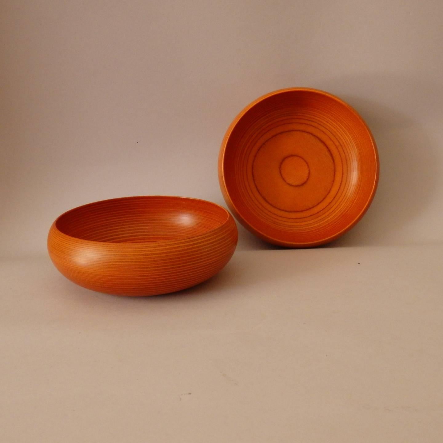 Pair of Finnish bowls. Lathe turned stacked laminate wood.