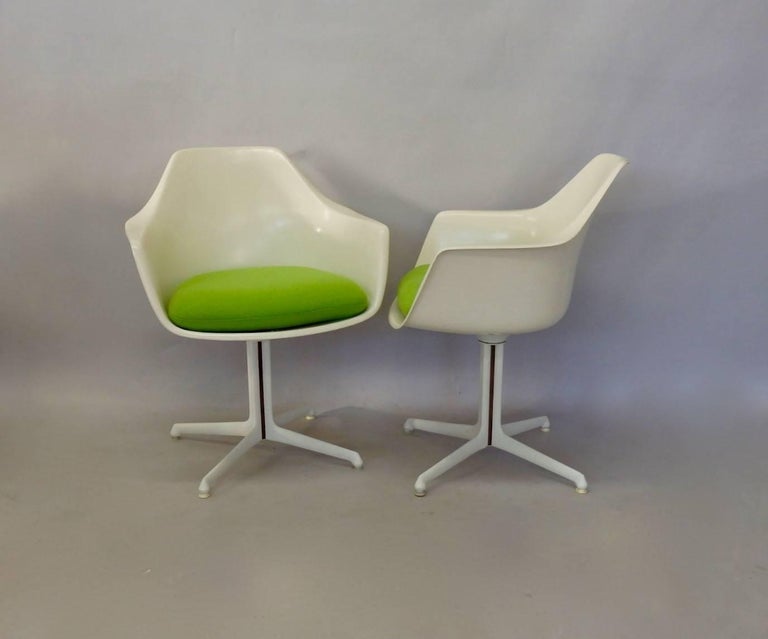 Four Burke White Fiberglass Swivel Dining Chairs For Sale at 1stdibs