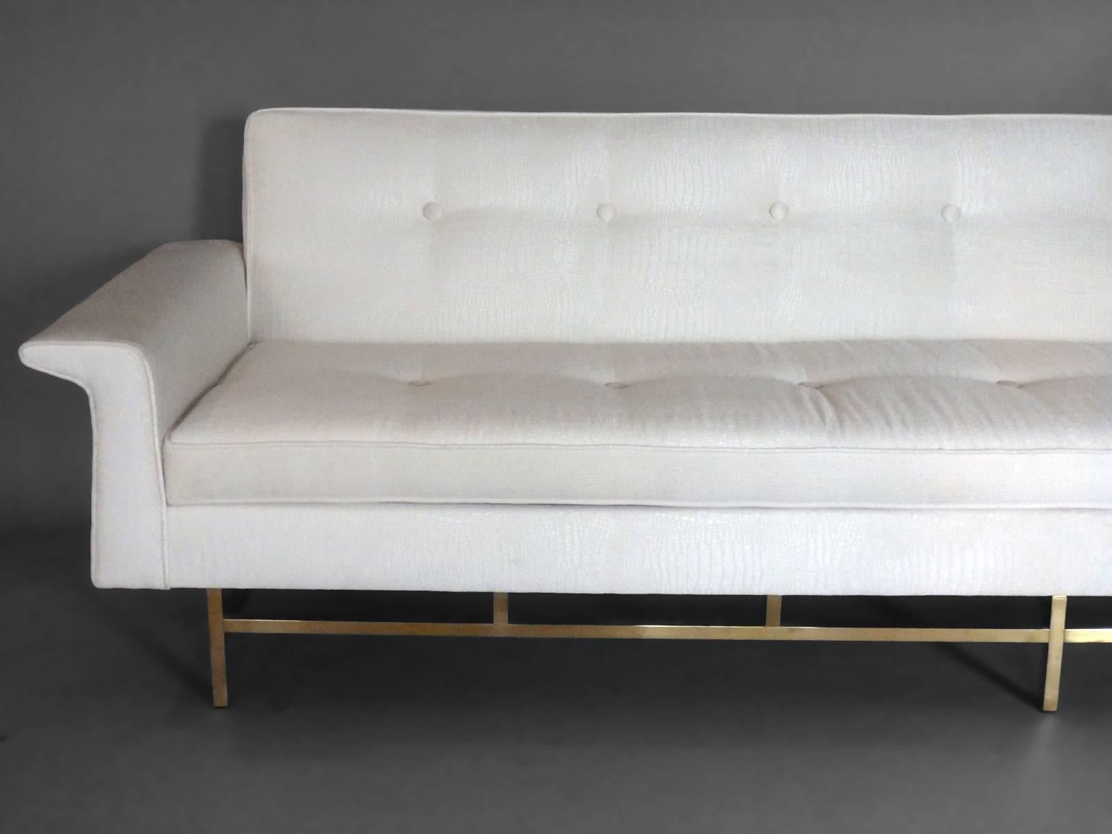 While this is a large well built couch built in the Edward Wormley Dunbar style . I have recently been informed it is in fact a Ben Seibel design for Stand Built furniture co.  Somewhat more rare than a Wormley design . Completely rebuilt from the