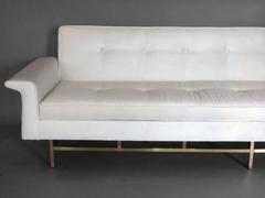 Ben Seibel for Stand Built  Dunbar style white sofa on architectural brass base