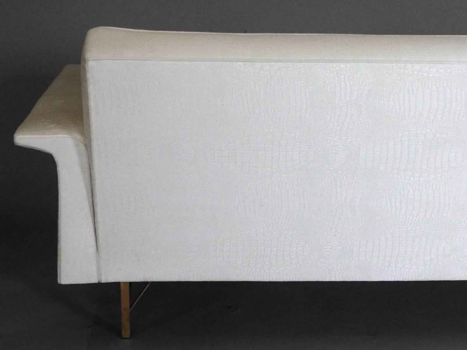 Mid-Century Modern Ben Seibel for Stand Built  Dunbar style white sofa on architectural brass base For Sale