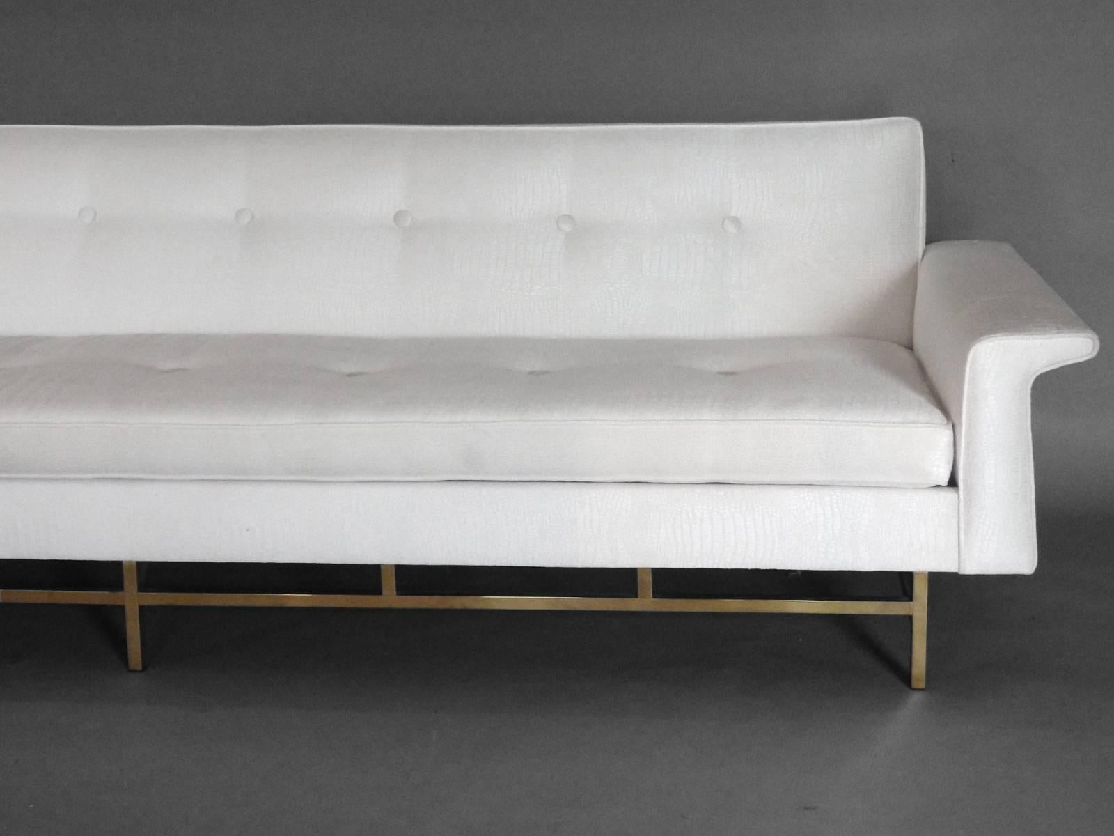 American Ben Seibel for Stand Built  Dunbar style white sofa on architectural brass base For Sale
