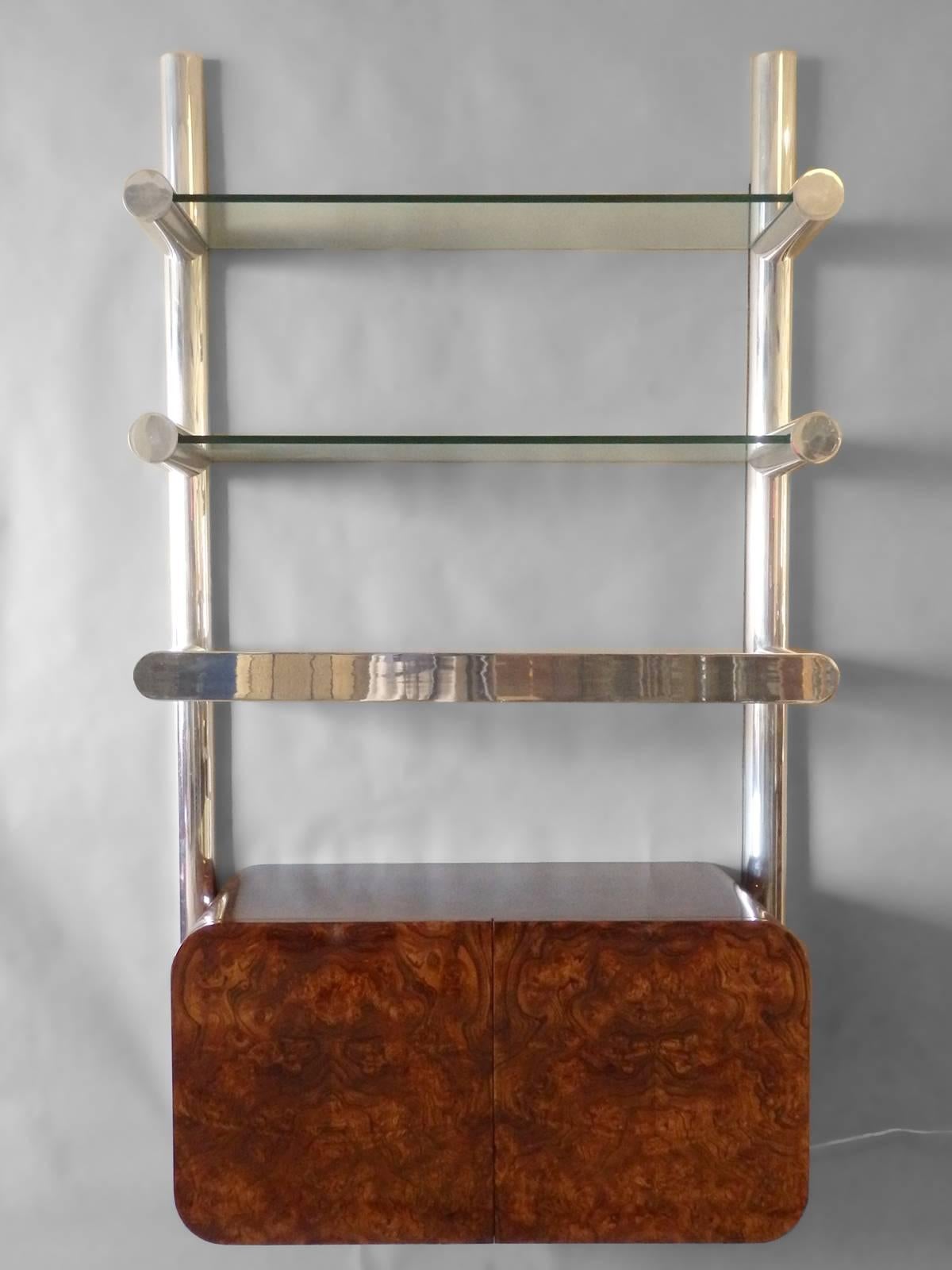 Janet Schweitzer for Pace.
Measures: 42 wide x 12.5 deep x 72 tall uprights.
Cabinet: 36 wide x 18 deep x 18 tall.
Aluminium vertical brackets are 6' tall (shown), 13.5