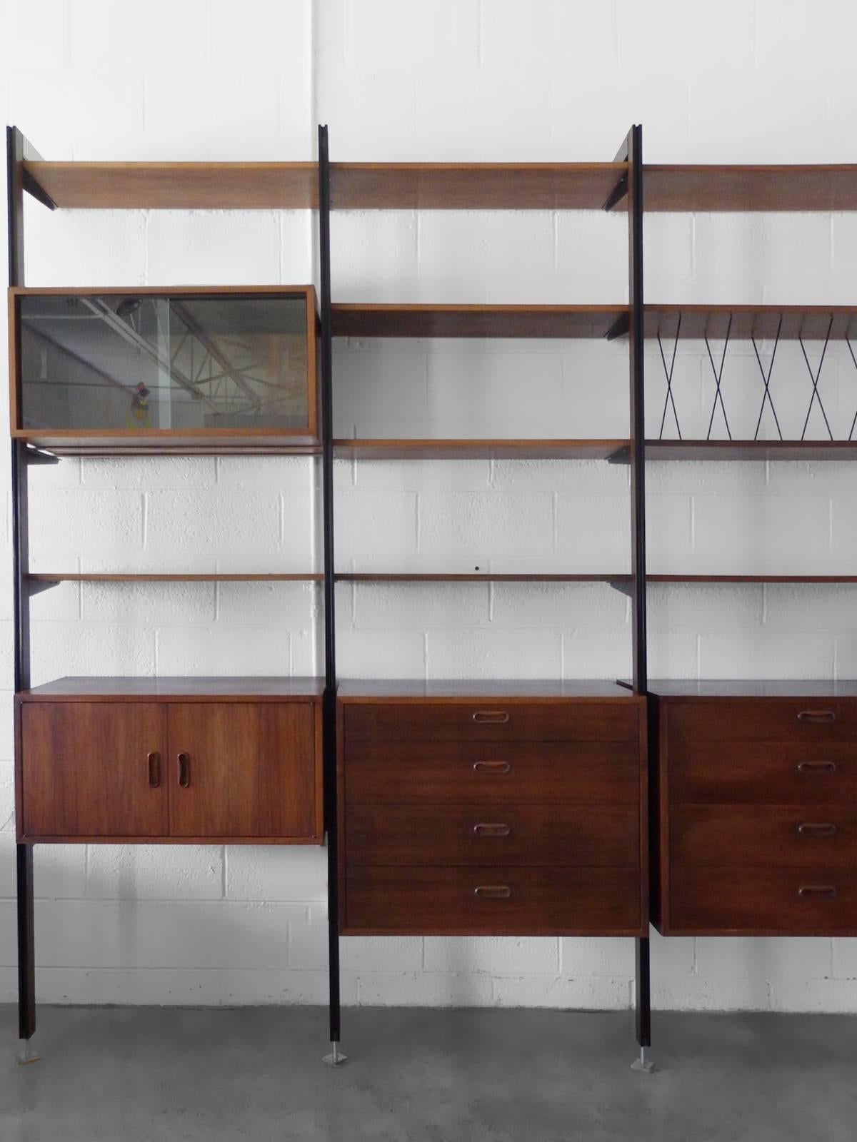 George Nelson for Omni.
Cabinets: 18” deep, shelves: 12” deep.
   
