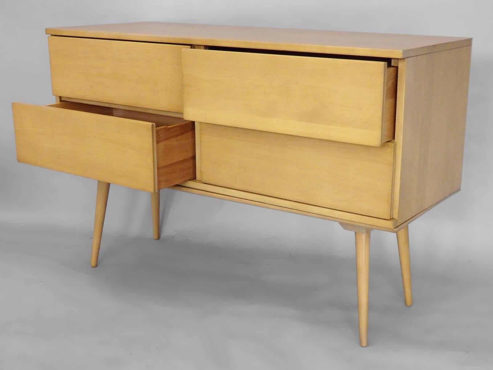 Four drawer cabinet on bench designed very much in the style of Paul McCobb. Actually designed or copied by disgruntled ex employee Marc Berge.
Cabinet:without bench  16.5