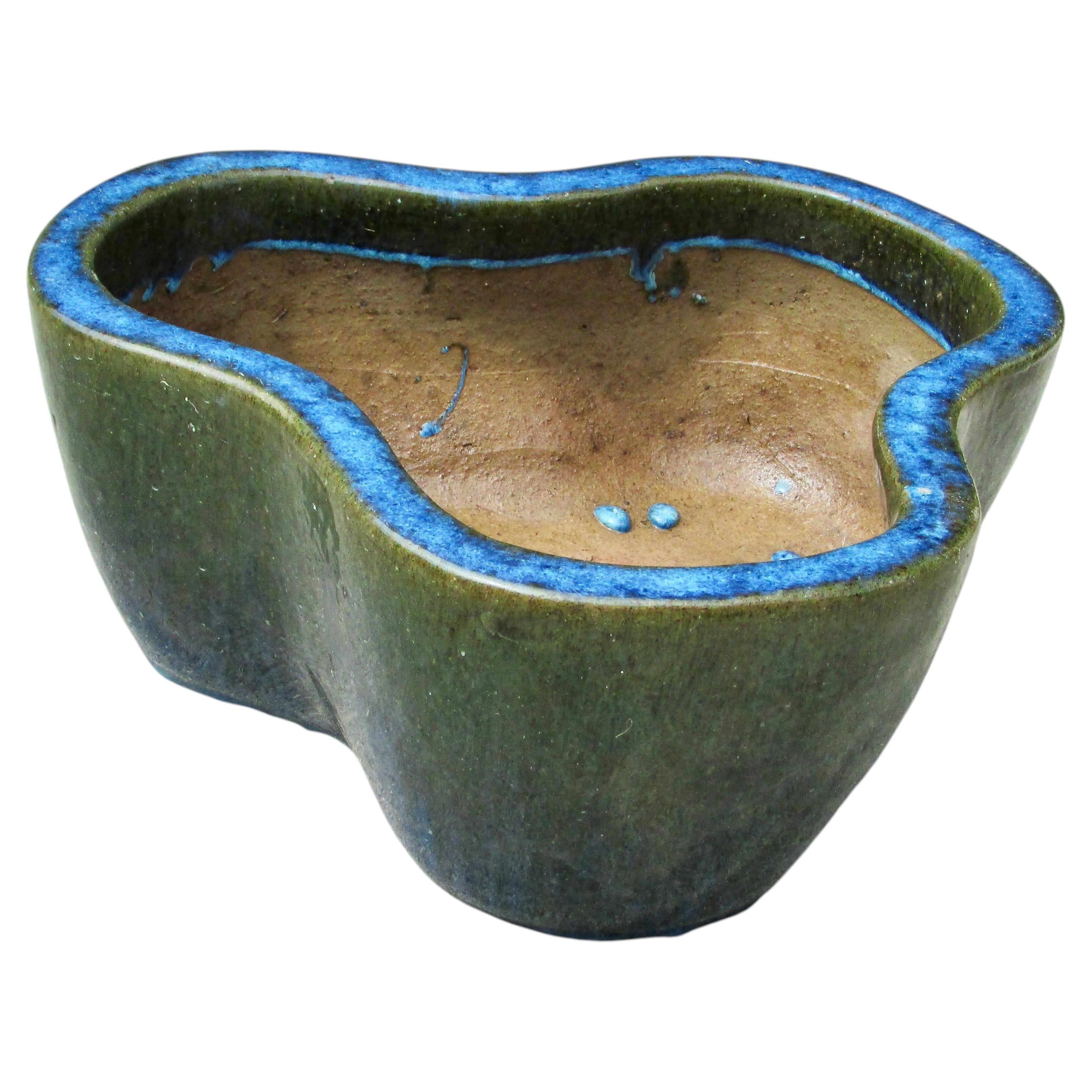 Thick walled bio-morphic planter pot in blue and green glaze For Sale