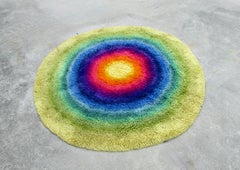Scandinavian modern round Rya rug in vivid yellow orange red blue and green