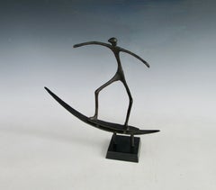 Modernist expressive bronze sculpture on granite of skateboarder