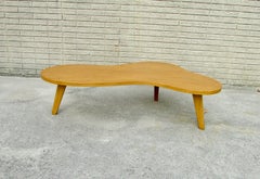 John Stuart blonde wood free form amoeba coffee table on splayed legs