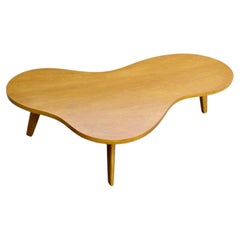 John Stuart blonde wood free form amoeba coffee table on splayed legs