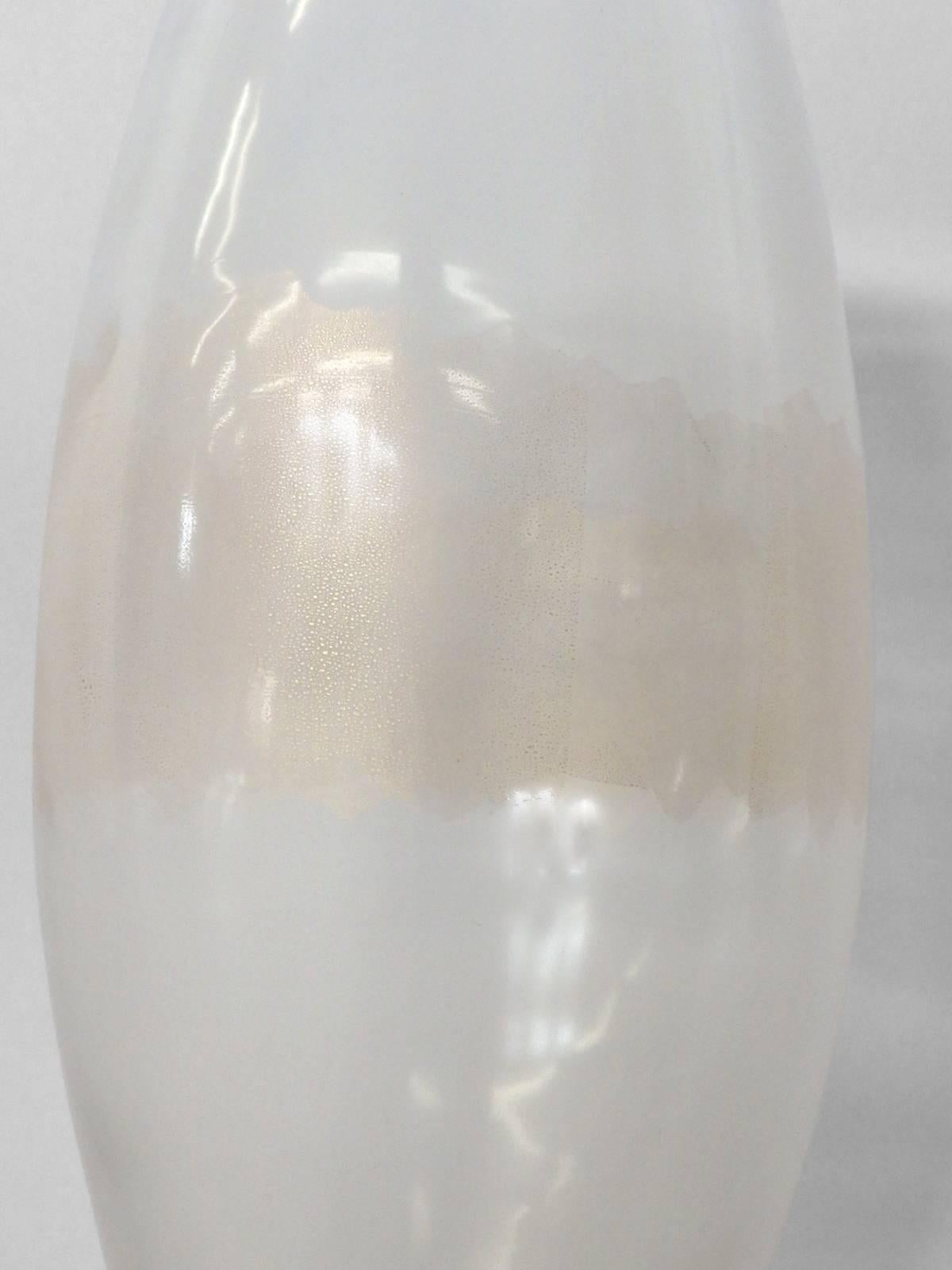Signed seguso A.V. Bulbous form glass vase with internal gold flek .