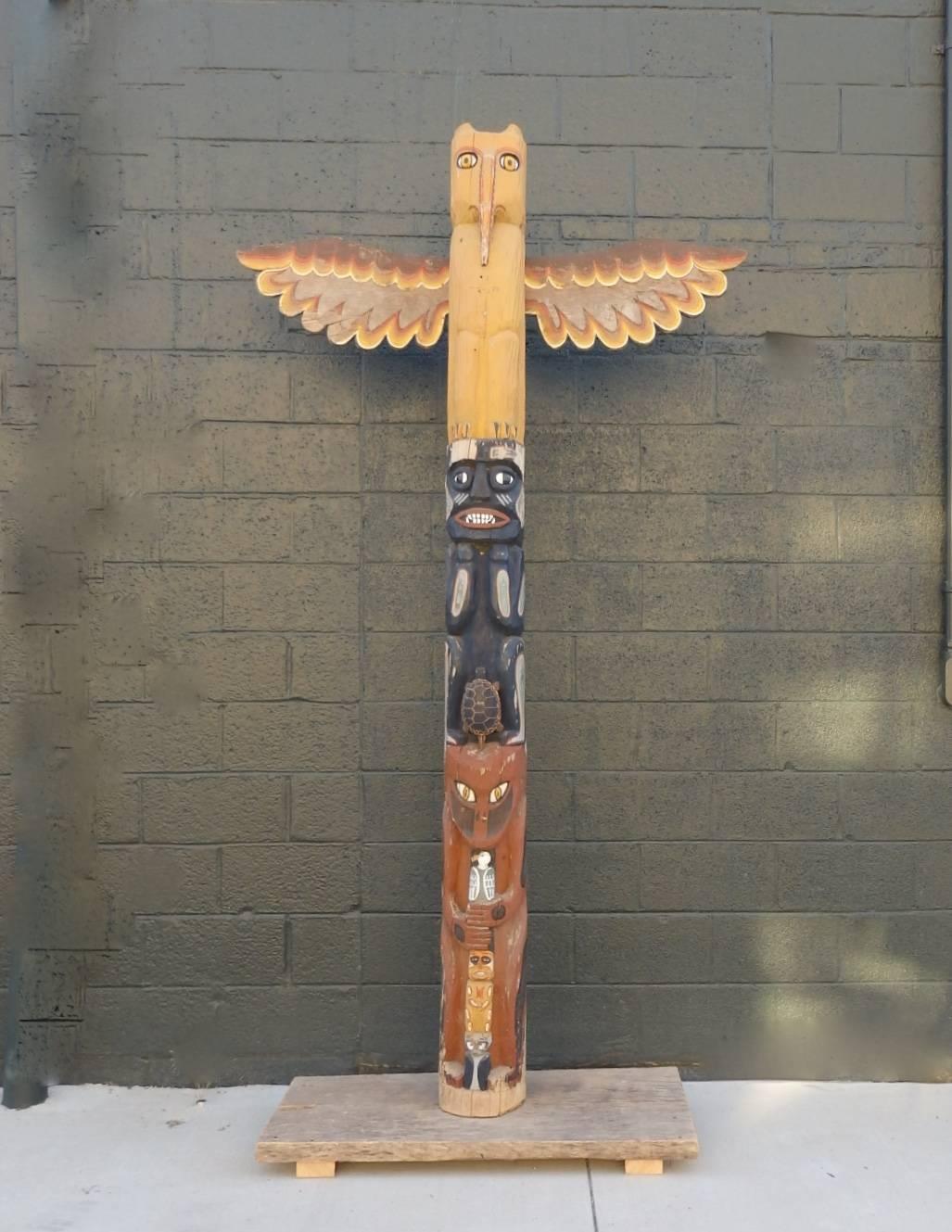 Hand-carved TOTEM pole purchased in Detroit. Possibly northern Michigan origin. Older mounting on boards.