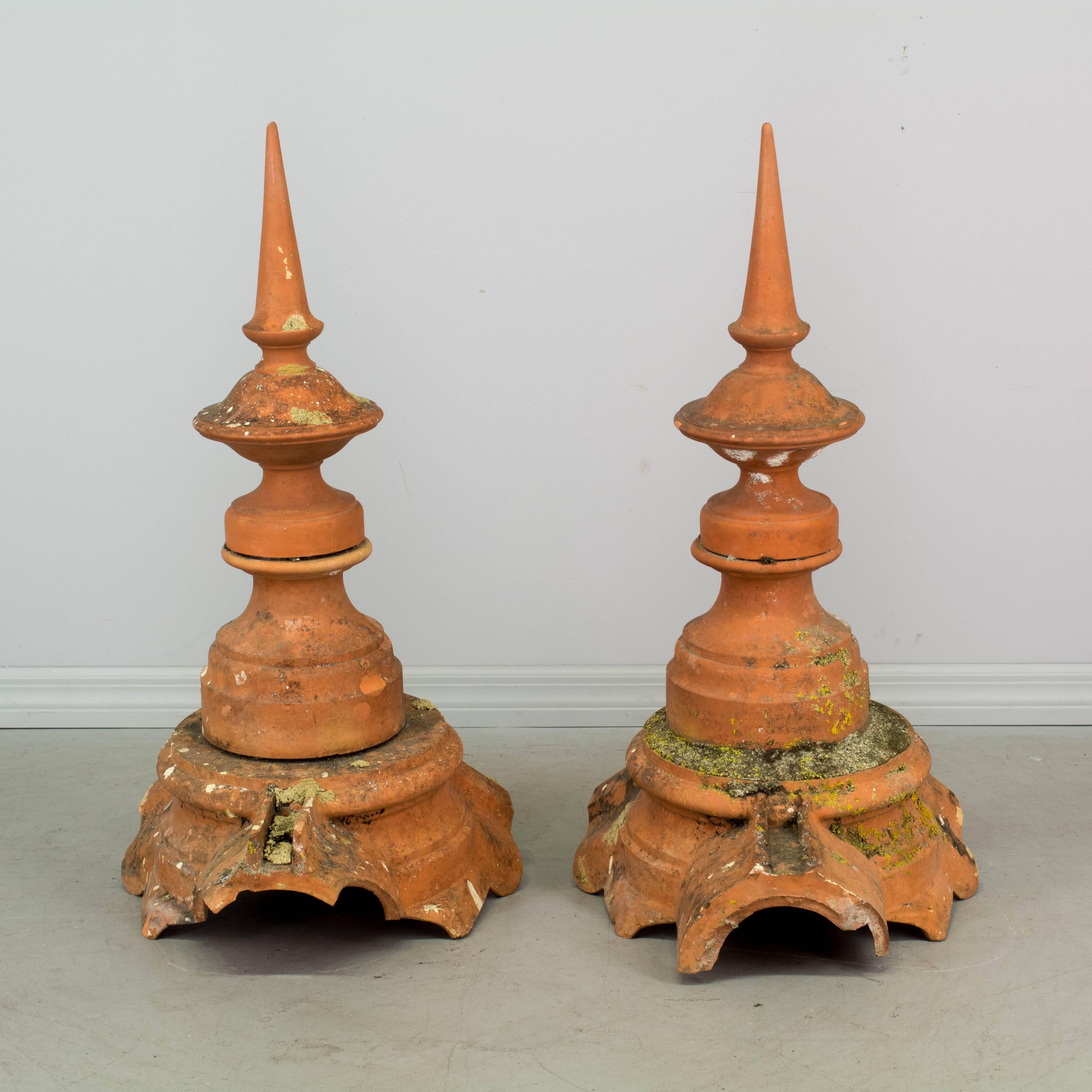 Pair of French terracotta architectural roof spires. In very good condition with nice old patina and remnants of moss. Excellent for use as sculptural elements in the garden.
More photos available upon request. We have a large selection of French