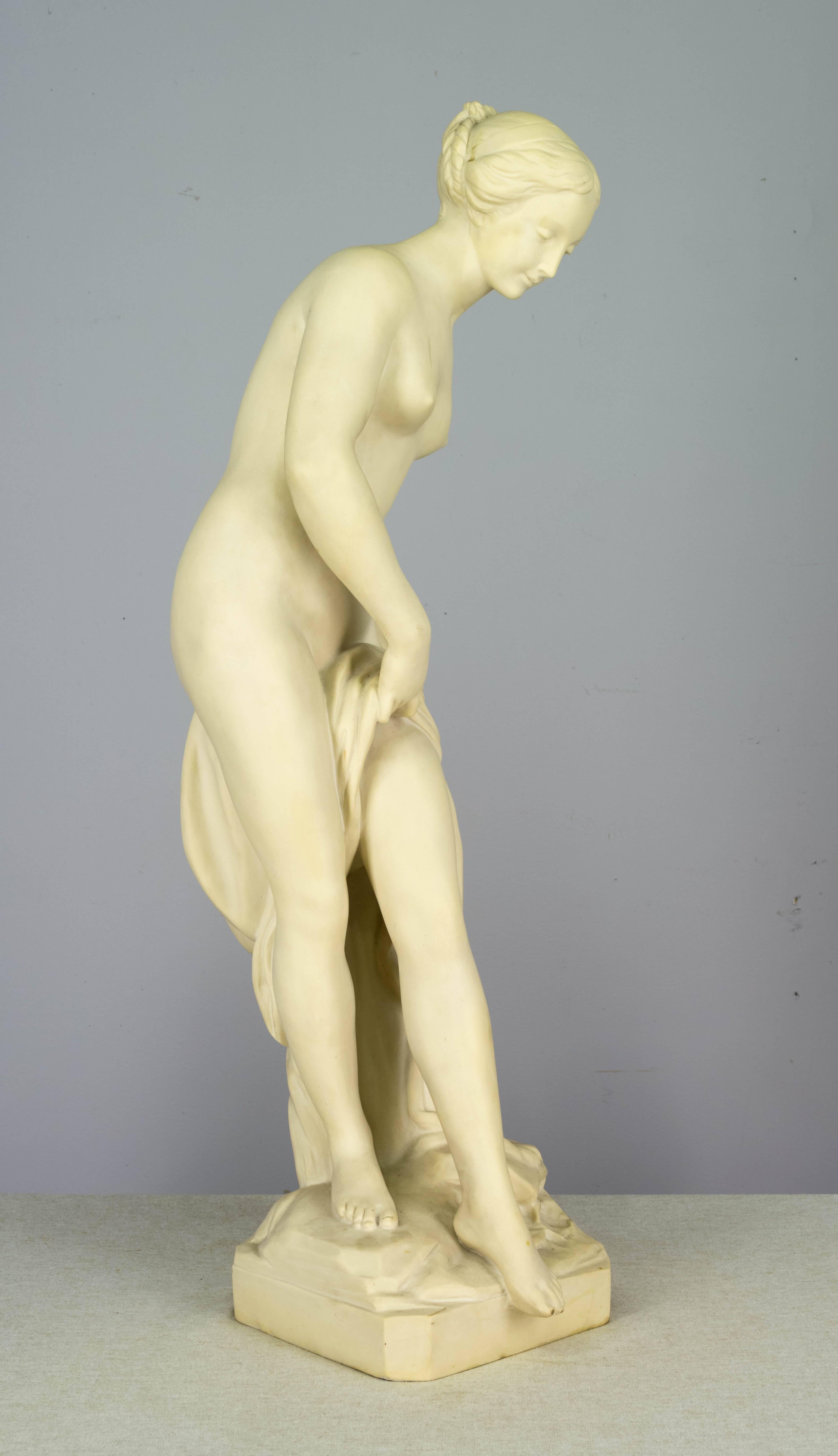 French composite marble sculpture of Venus after the bath. A lovely nude with classical proportions.