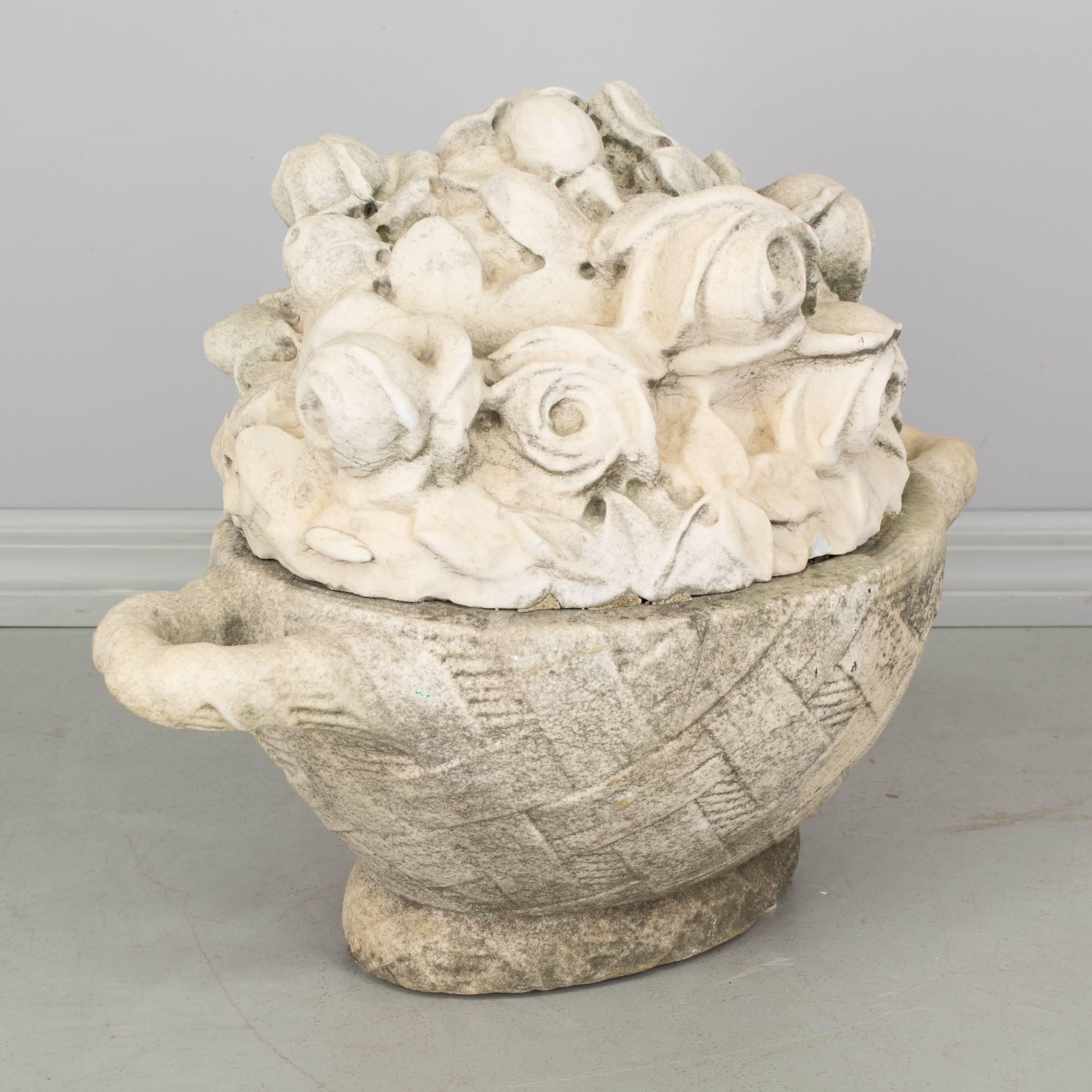 A lovely French marble flower basket garden ornament with nice old mossy patina.
More photos available upon request. We have a large selection of French antiques. Please visit our showroom in Winter Park, Florida.