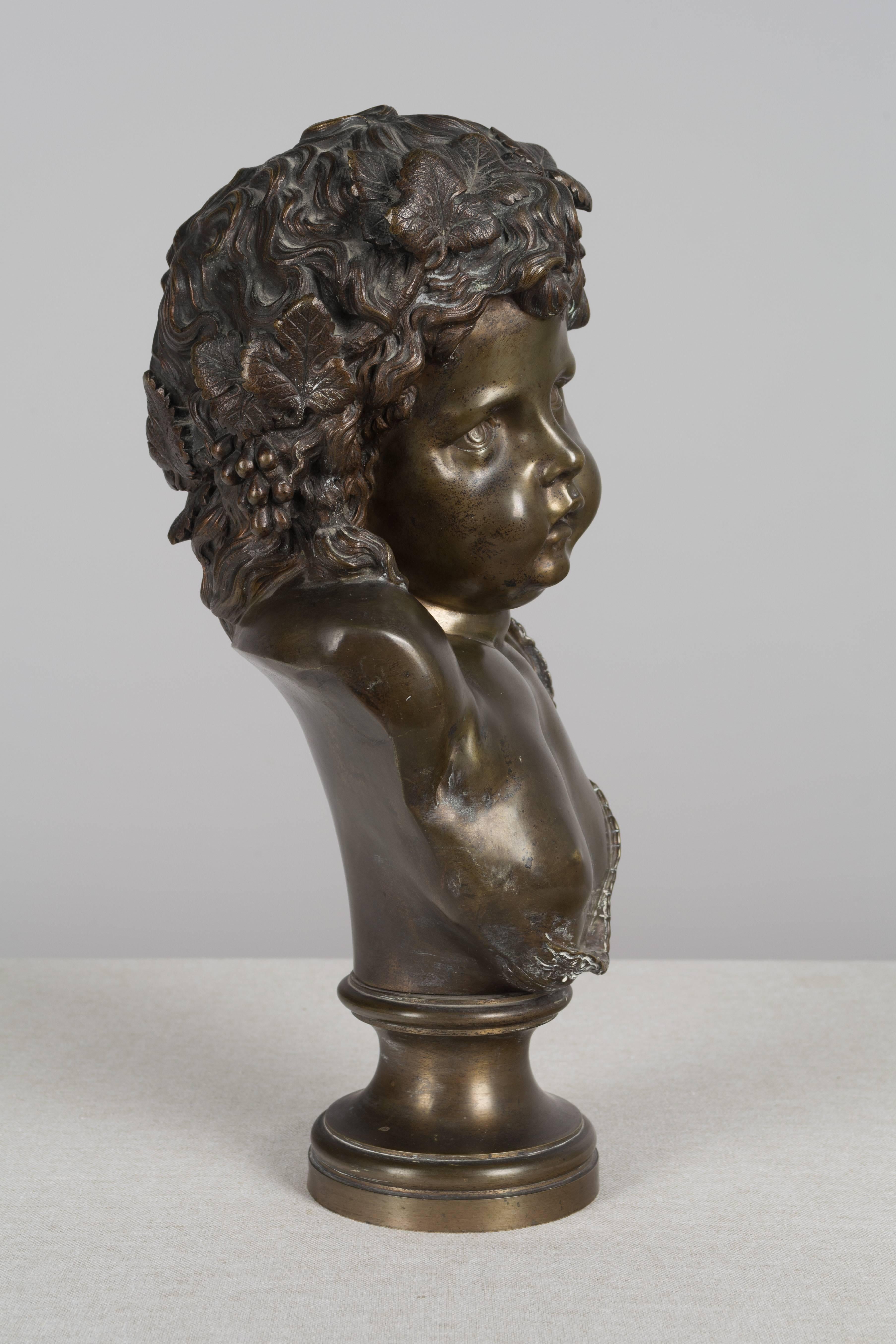 19th century French bronze bust of the young Bacchus with a cherubic face and a garland of grape leaves on his head. Unsigned.
More photos available upon request. We have a large selection of French antiques. Please visit our showroom in Winter