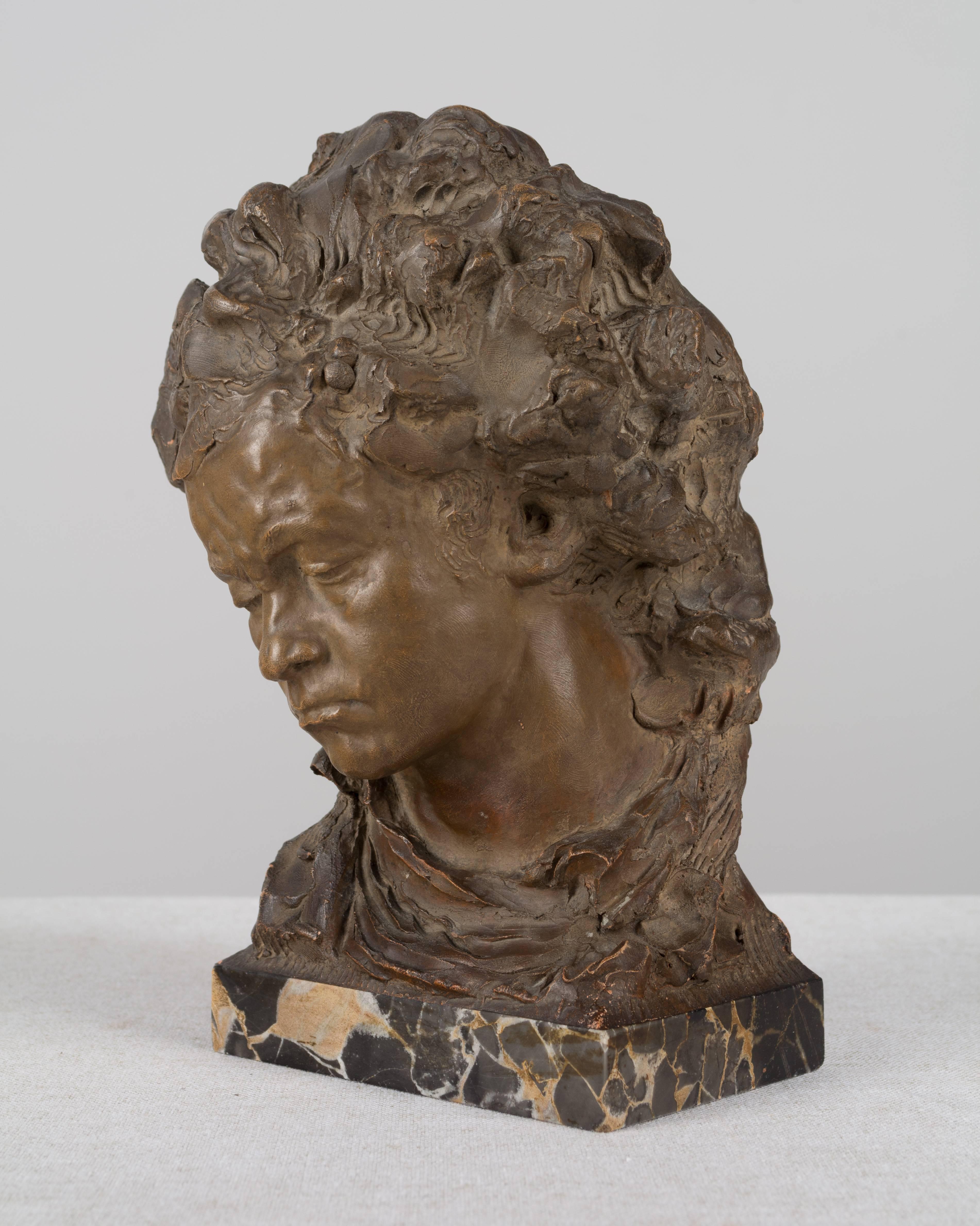 A small bust of Beethoven by Italian artist Fernando Ciancainianni (1886-1954). Terra cotta on marble base. Signed Fernand Cian, Paris and inscribed SALON 1923. Measures: 9 high x 6.5 wide 5 deep Weight: 4.5 lbs.
More photos available upon request.