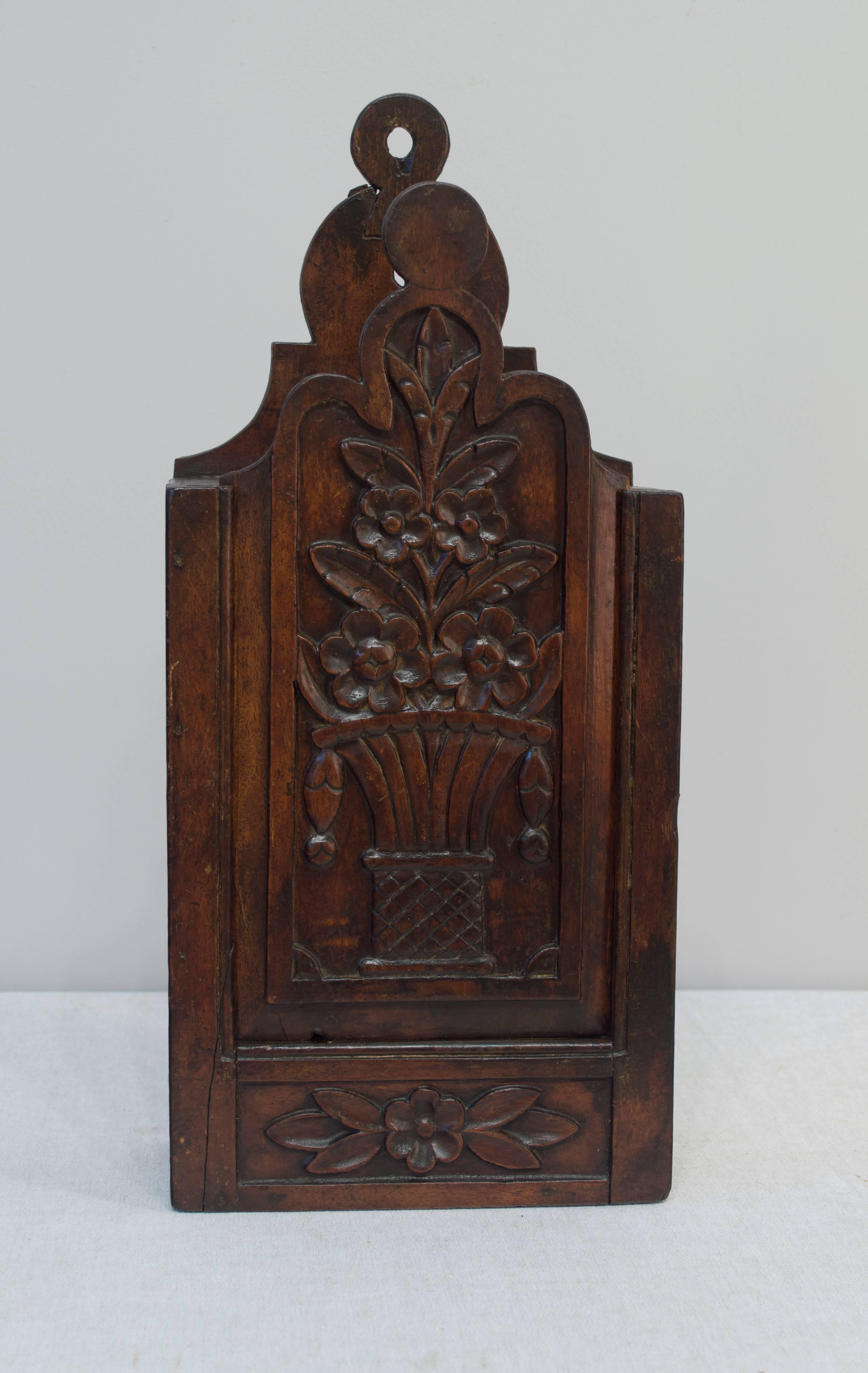 18th century French fariniere made of walnut with dovetail construction and nicely detailed hand-carved relief on front panel. From Provence, a fariniere is a sliding paneled box used for storing flour. Restoration on top.
More photos available upon