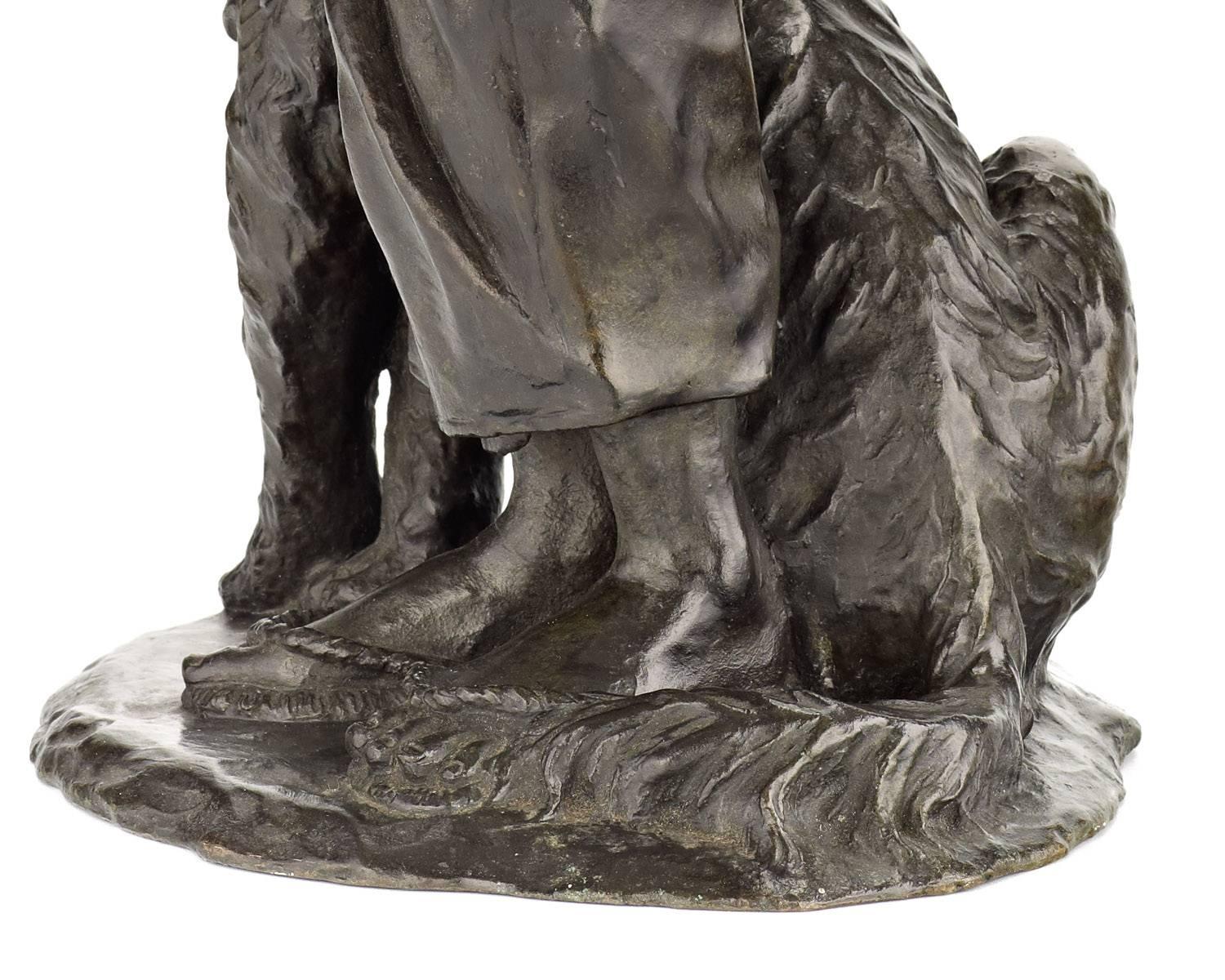 A large bronze sculpture of a young boy looking down at a dog seated at his feet. A large ring hangs from his right forearm. Signed on the base in cursive: Made by Masa. A charming bronze okimono, or objet d'art, from the Meiji Period (1868-1912) an