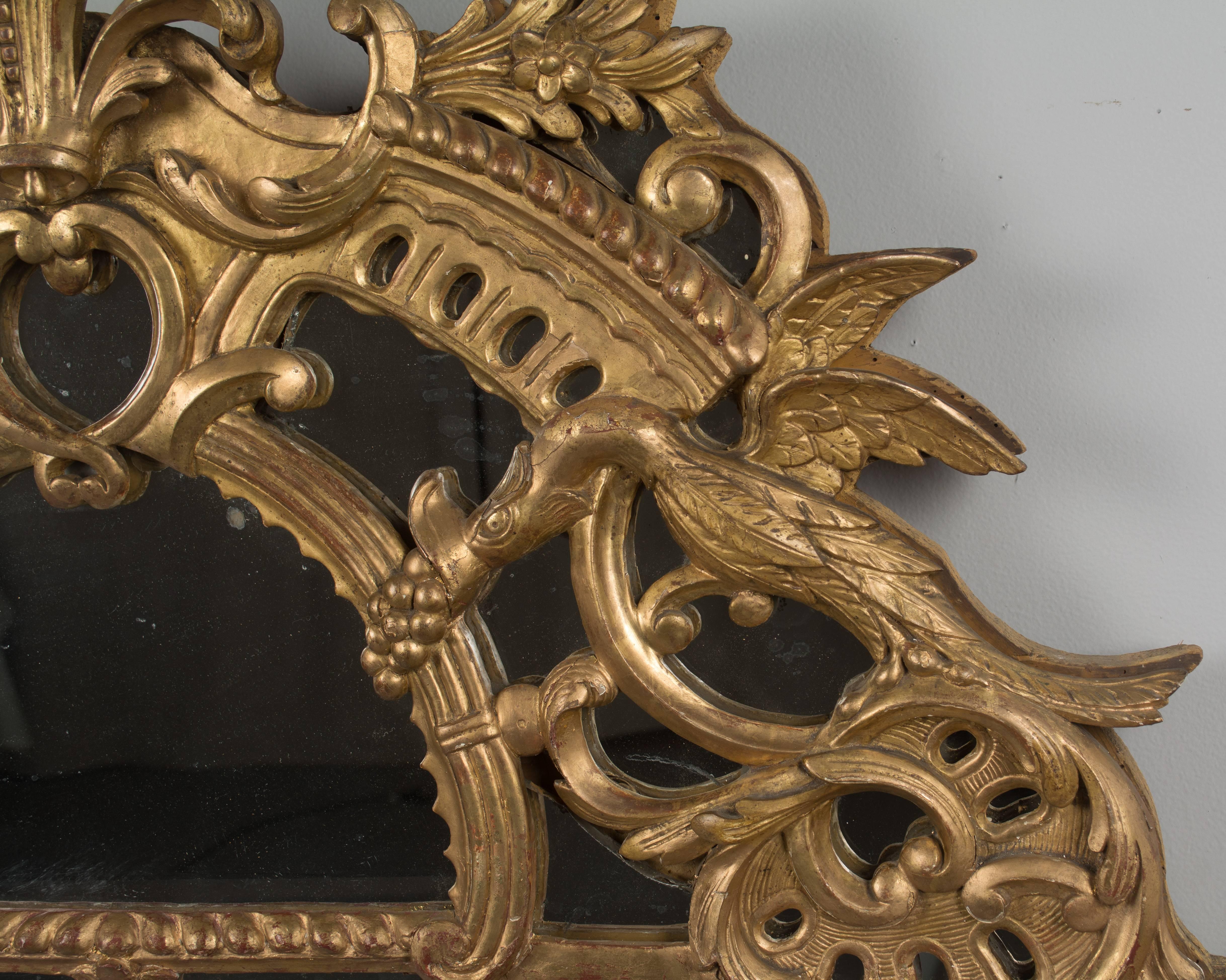 18th Century and Earlier 18th Century French Gilded Demilune Mirror