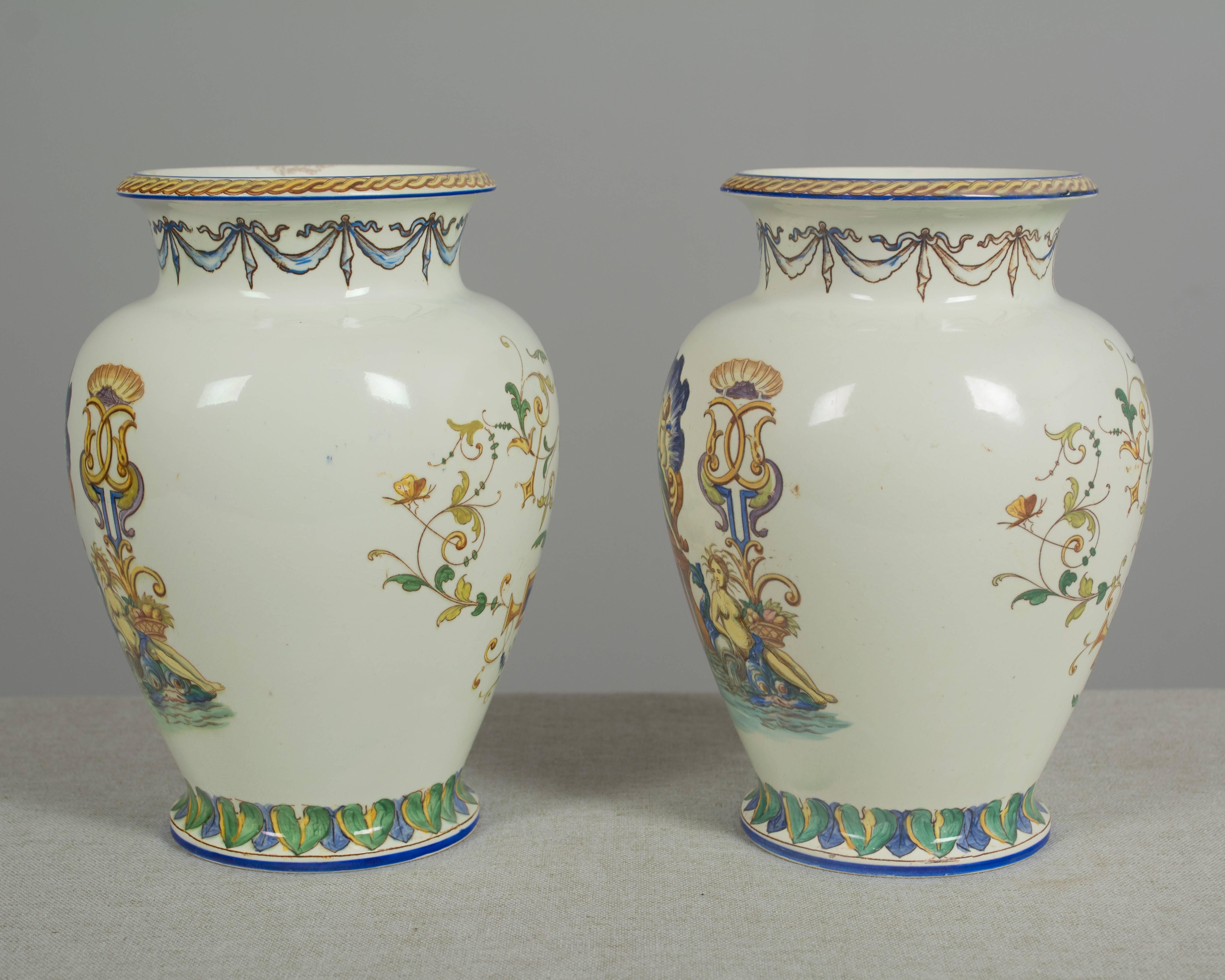 Pair of 19th century French faience vases by Jules Vieillard of Bordeaux. Italian Renaissance style decoration depicting Venus. Mint condition. Mark to underside: JVB. Please refer to photos for more details. We have a large selection of French
