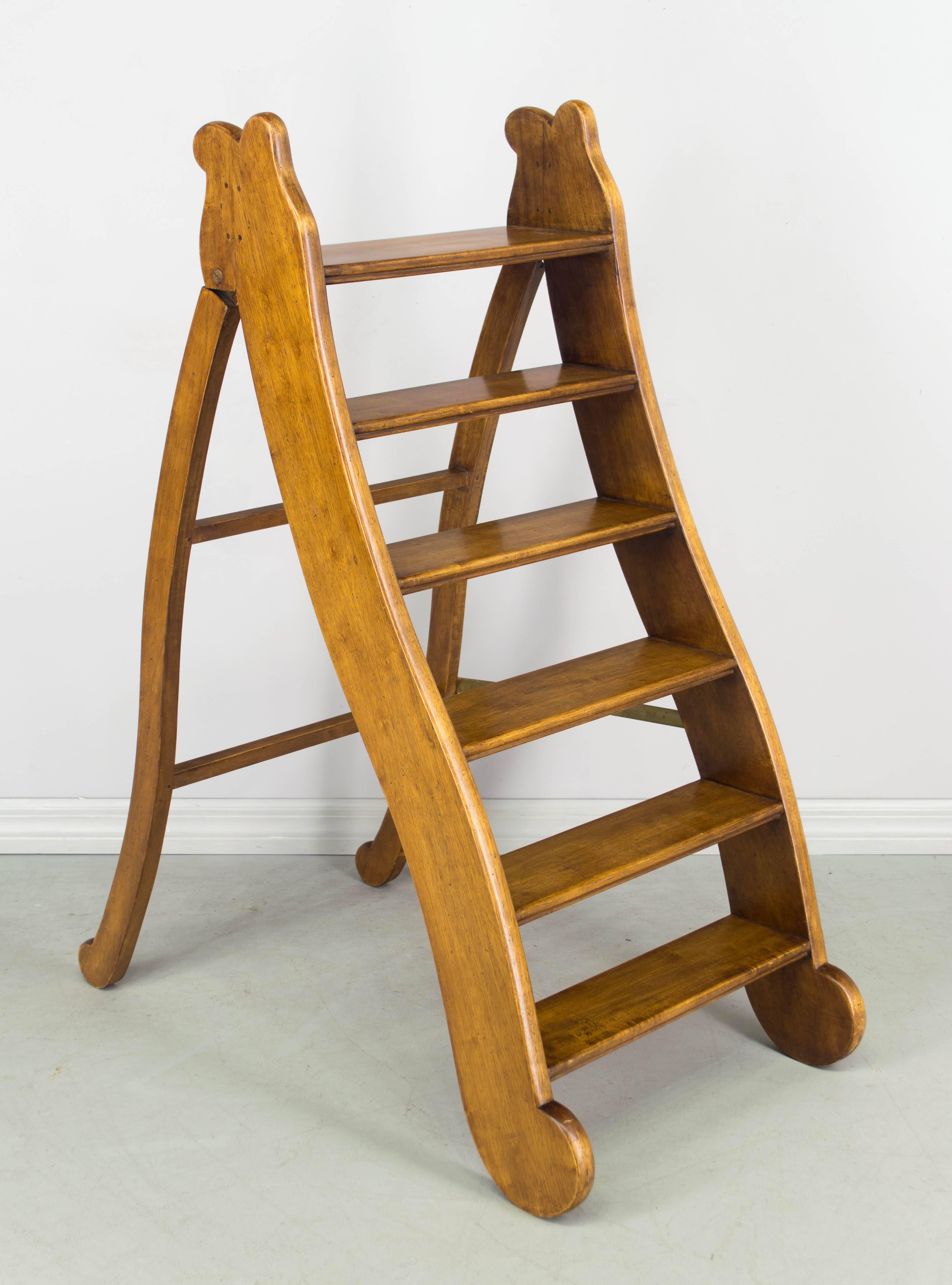 19th century French folding library ladder with nice curving shape. Made of solid, 1